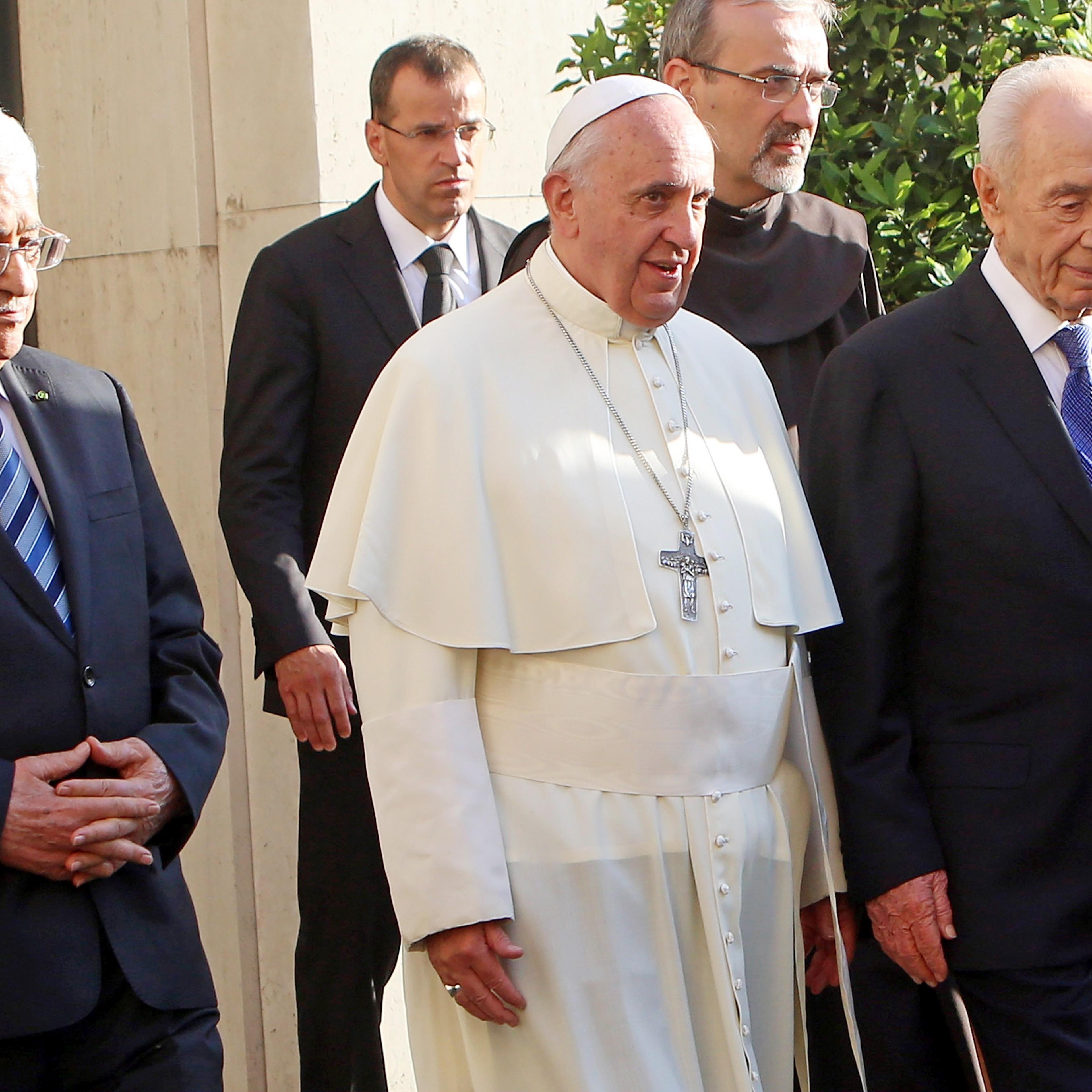 From left: Palestinian President Mahmoud Abbas, Pope Francis and Israeli President Shimon Peres reach the Vatican Garden for a meeting of prayer for peace.