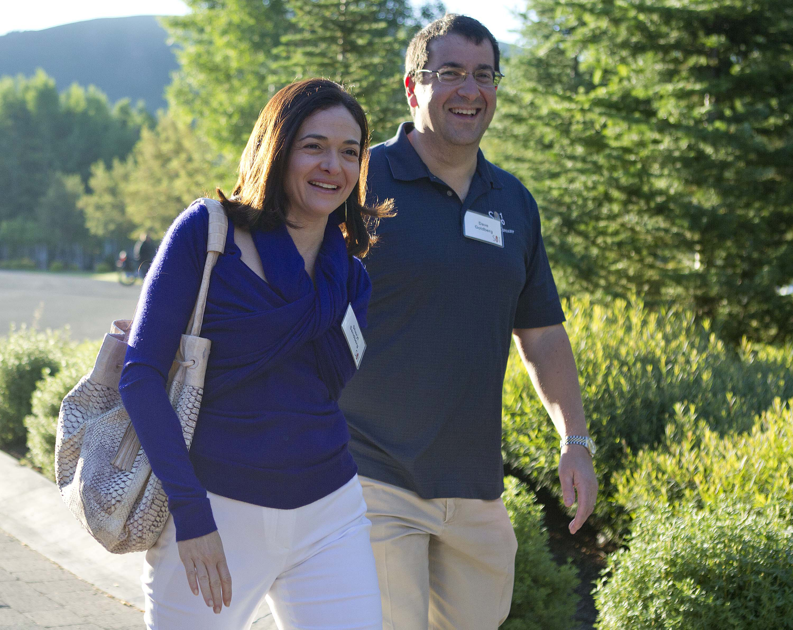 Facebook chief operating officer Sheryl Sandberg, left, and Dave Goldberg, CEO of Survey Monkey, arrive at the Sun Valley Inn for the 2011 Allen and Co. Sun Valley Conference, on July 6, 2011, in Sun Valley, Idaho.