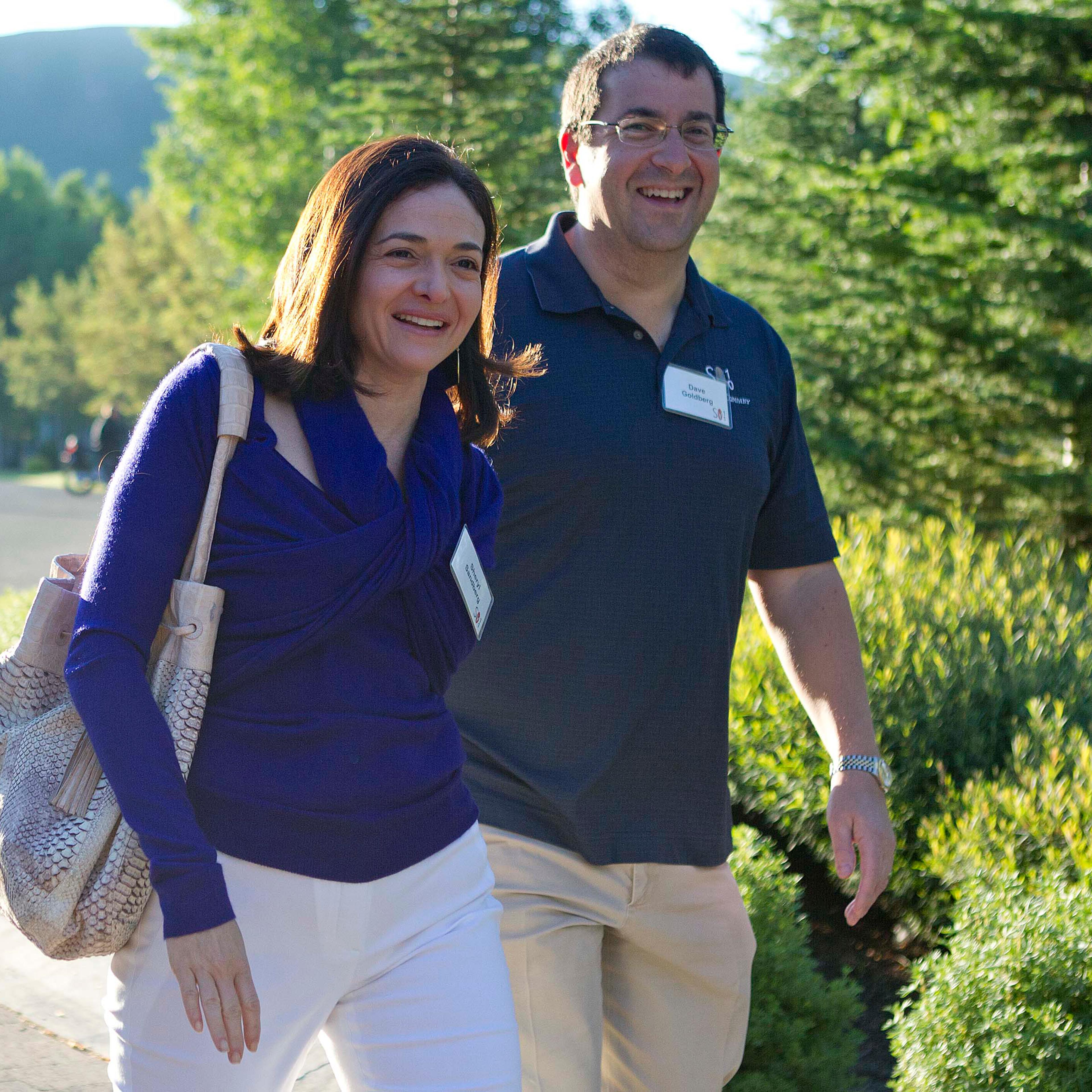 Facebook chief operating officer Sheryl Sandberg, left, and Dave Goldberg, CEO of Survey Monkey, arrive at the Sun Valley Inn for the 2011 Allen and Co. Sun Valley Conference, on July 6, 2011, in Sun Valley, Idaho.