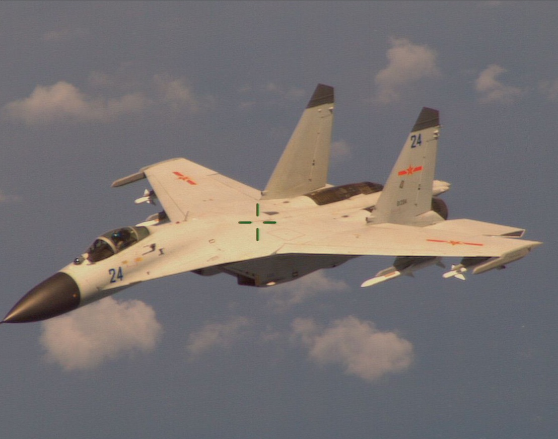 In this Pentagon handout, a Chinese fighter jet is seen from a U.S. Navy P-8 Poseidon aircraft during an incident in which the Pentagon says the Chinese jet came dangerously close to the American aircraft.
