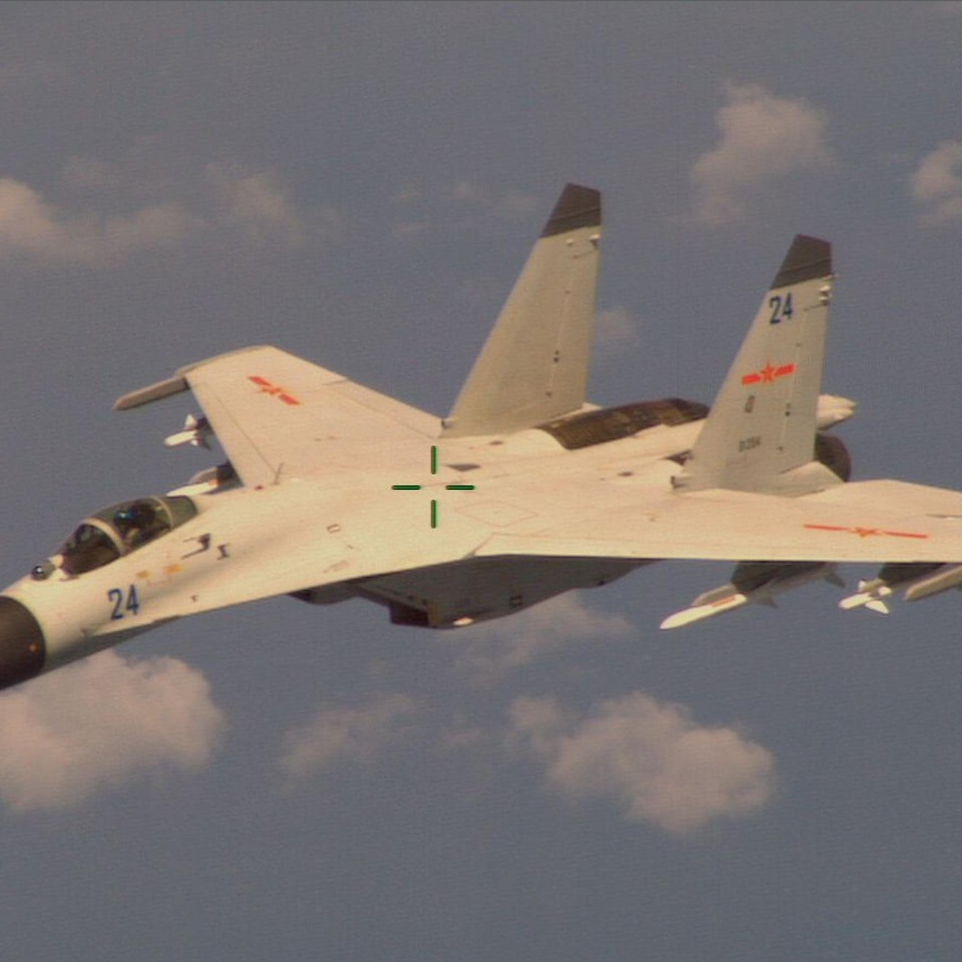 In this Pentagon handout, a Chinese fighter jet is seen from a U.S. Navy P-8 Poseidon aircraft during an incident in which the Pentagon says the Chinese jet came dangerously close to the American aircraft.
