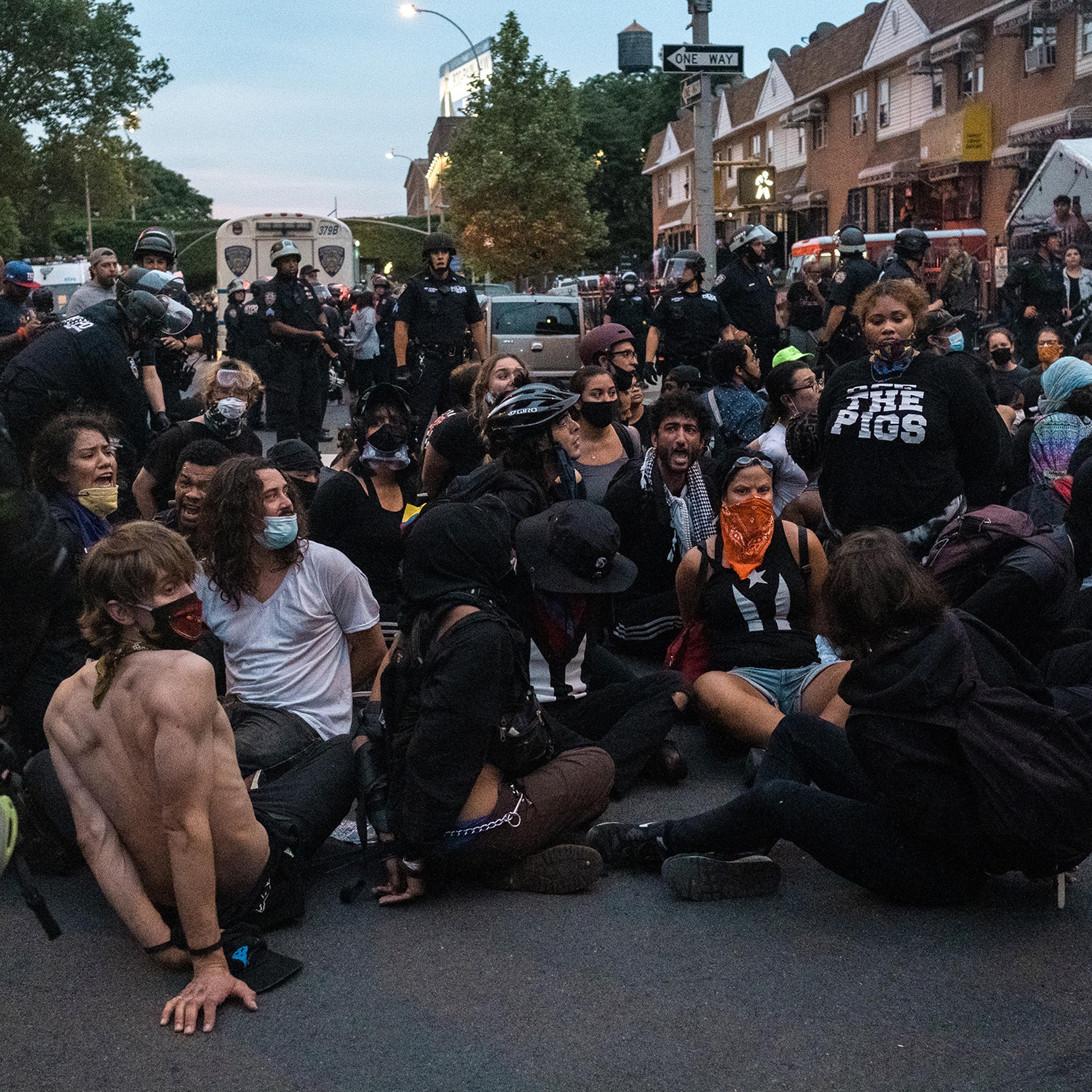 Demonstrators after being detained by police officers during a protest against the death of George Floyd in Mott Haven, the Bronx, on June 4