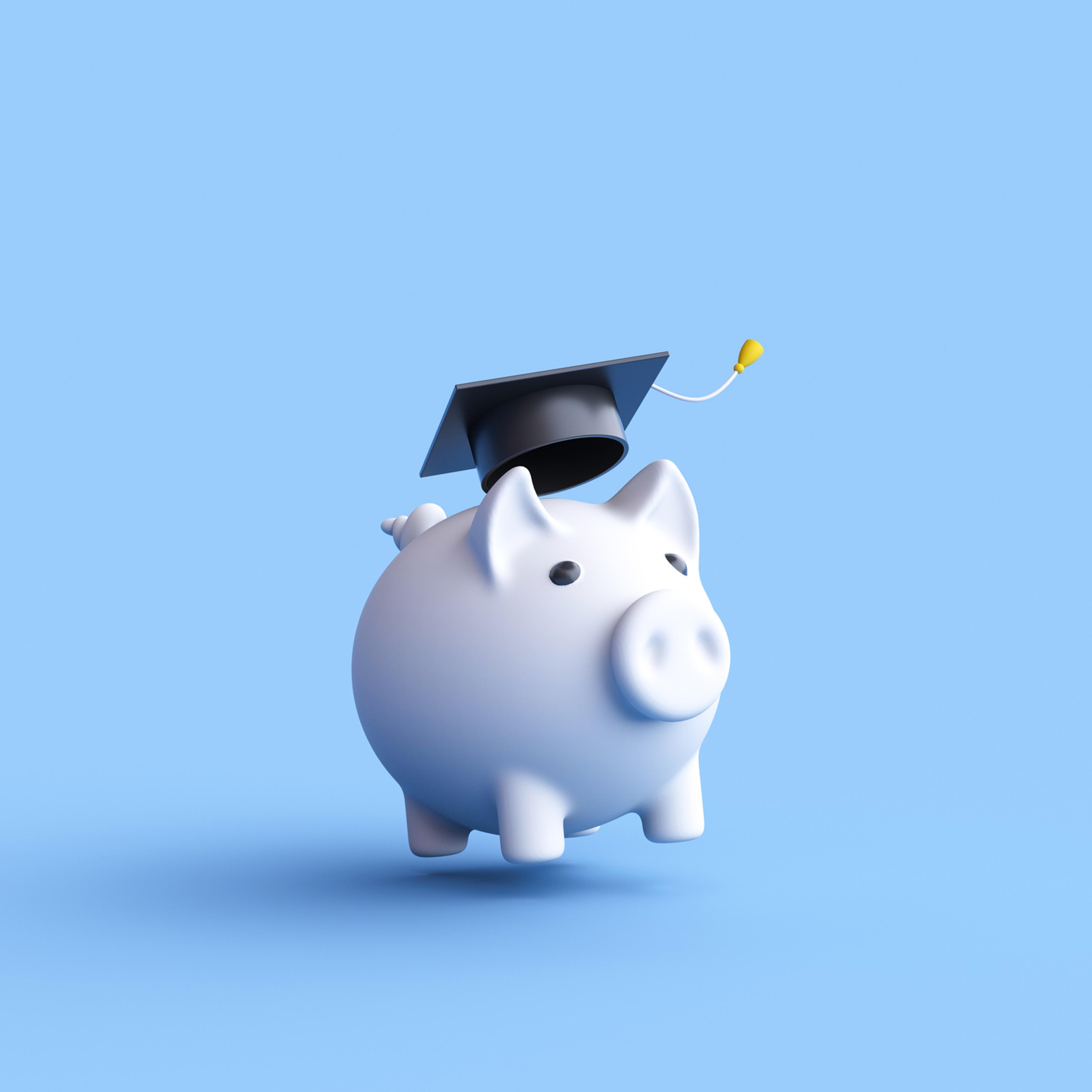 Piggy bank with graduation cap