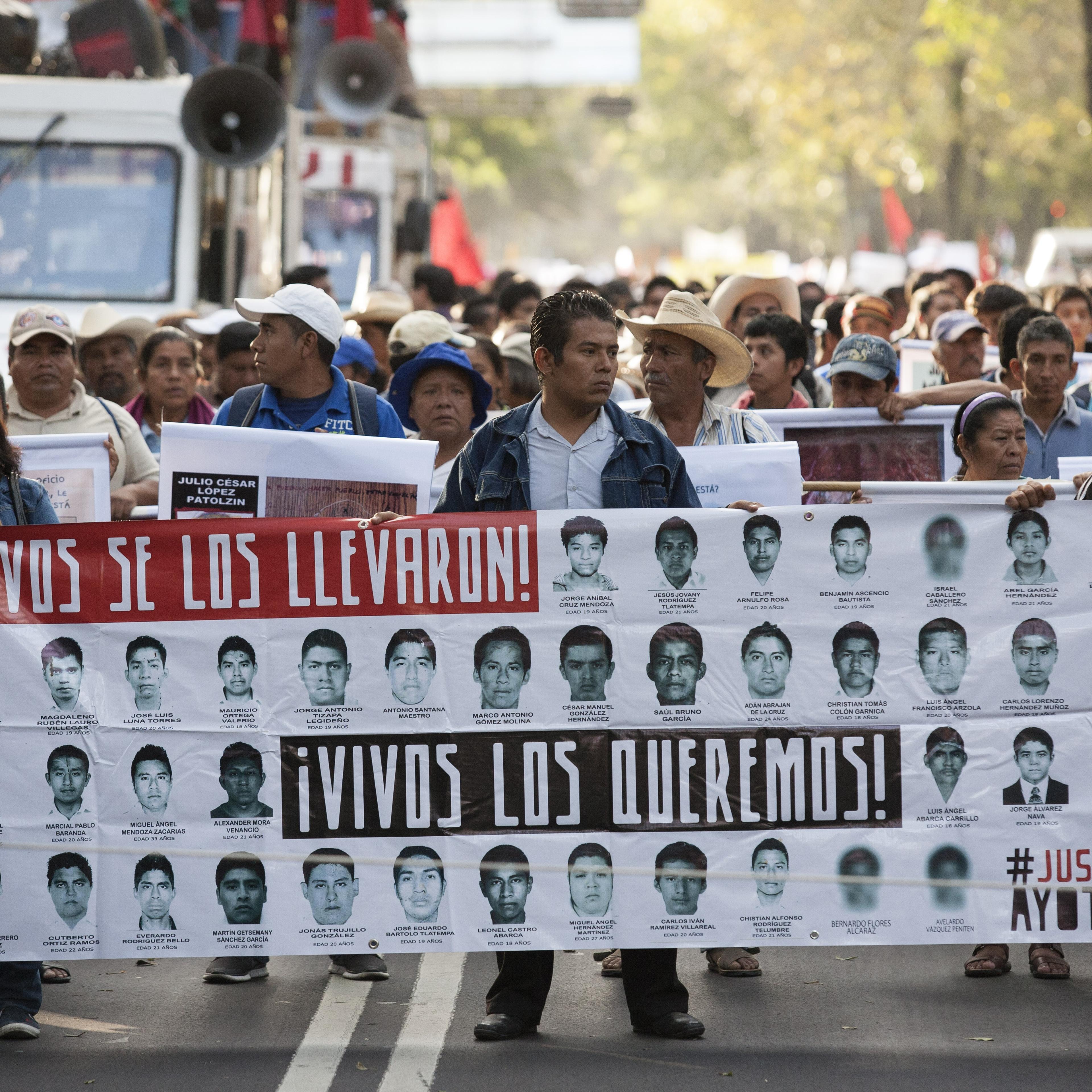 Protestors and family of 43 missing students from Guerrero State in Mexico march to protest the government and demand answers of the missing students on Nov. 5, 2014 in Mexico, City.