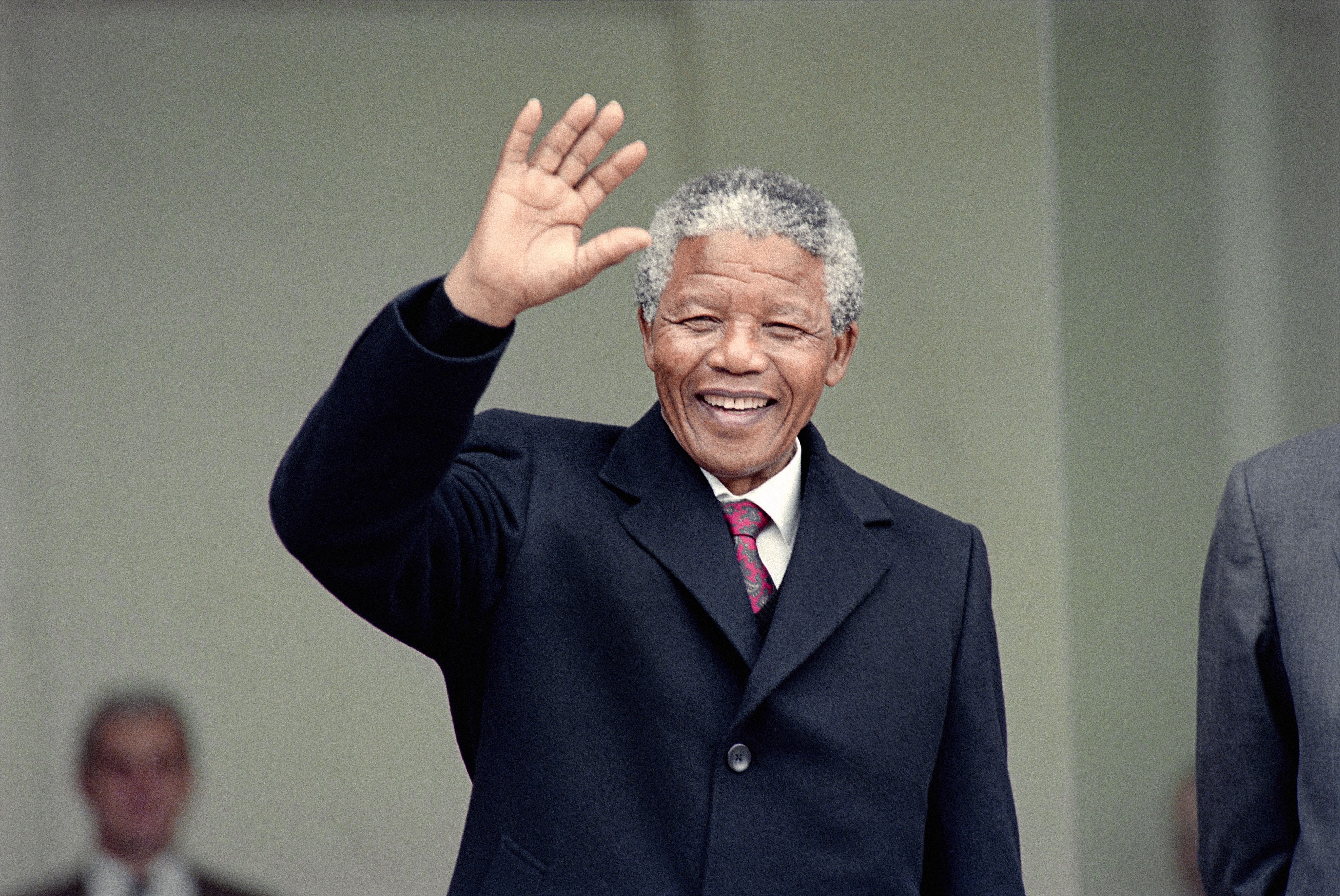 Nelson Mandela waves in Paris, June 7, 1990.