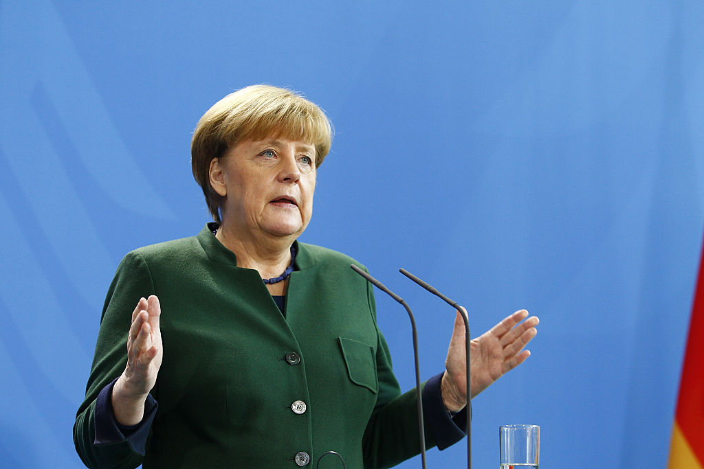 German Chancellor Angela Merkel and Greek Prime Minister Alexis Tsipras arrive to speak to the media prior to talks at the Chancellery on December 16, 2016 in Berlin, Germany. The two leaders are to reportedly mainly discuss EU-related issues, including 