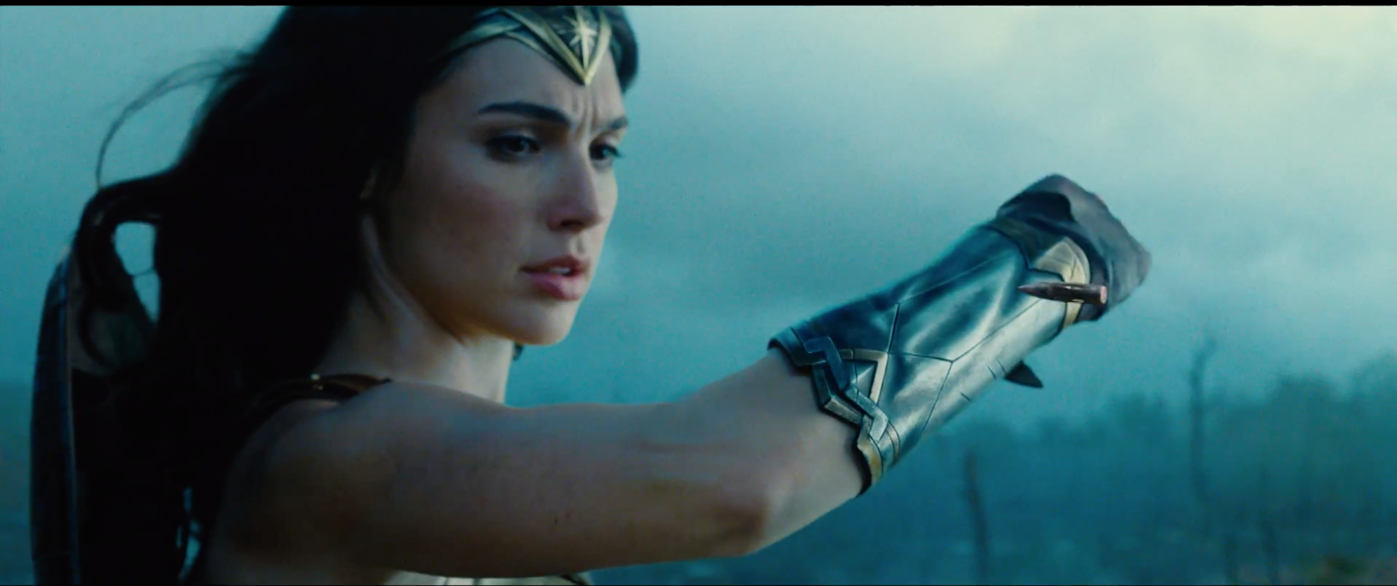 Gal Gadot blocks a bullet as Wonder Woman
