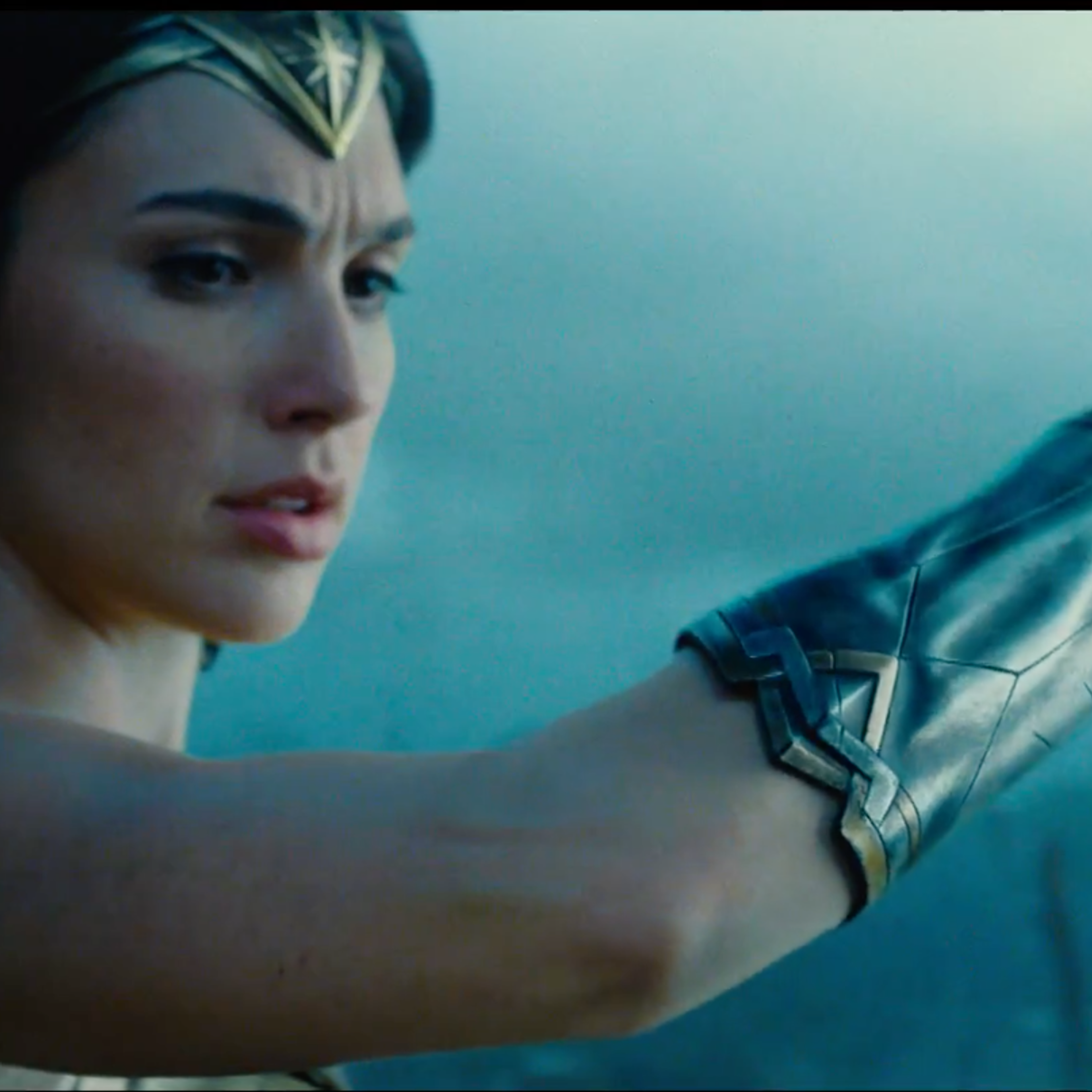 Gal Gadot blocks a bullet as Wonder Woman