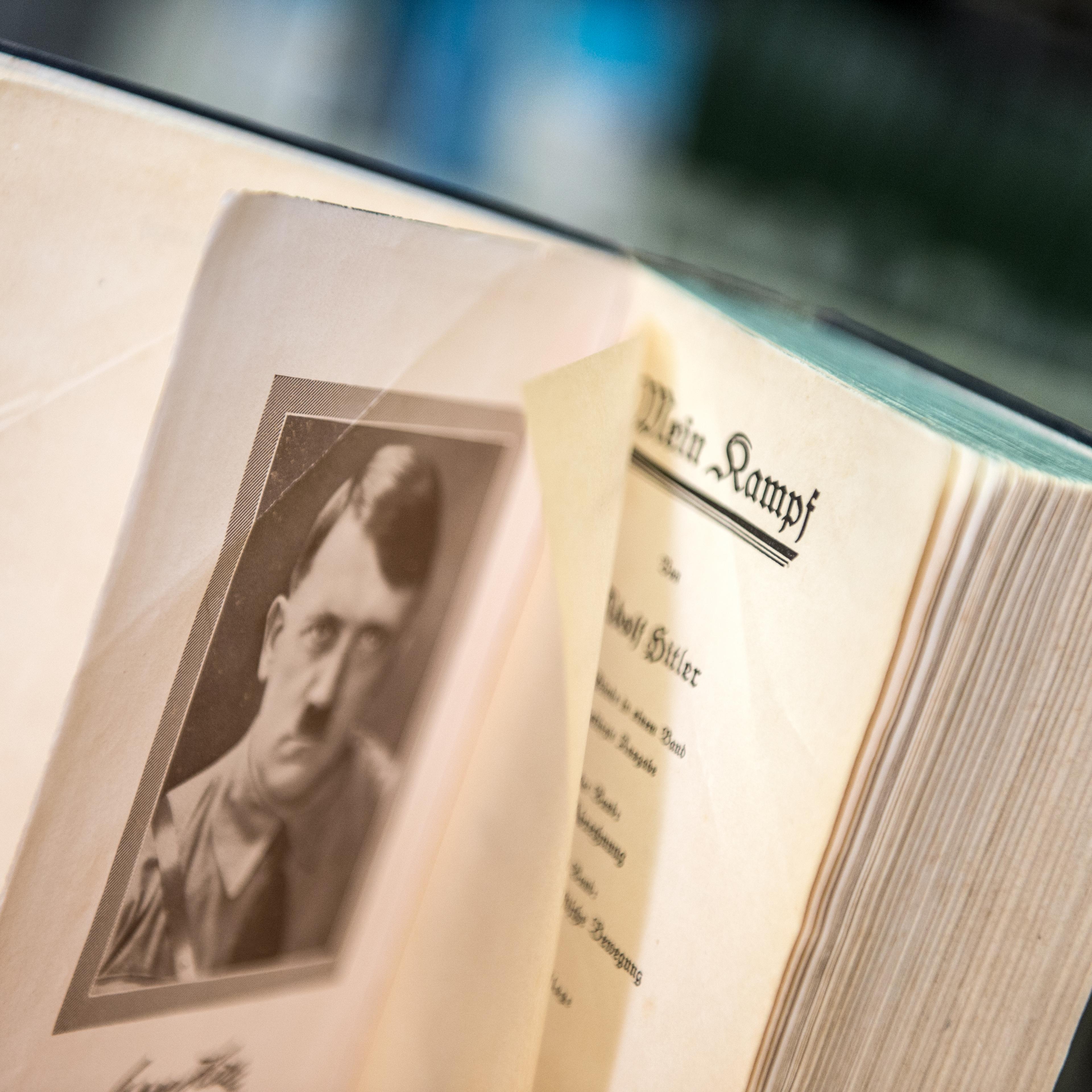 An opened page of the original edition of Hitler's inflammatory pamphlet 'Mein Kampf' shows a portrait of national socialist dictator Adolf Hitler, in a bookshop in Frankfurt, Germany on Jan.7, 2016.