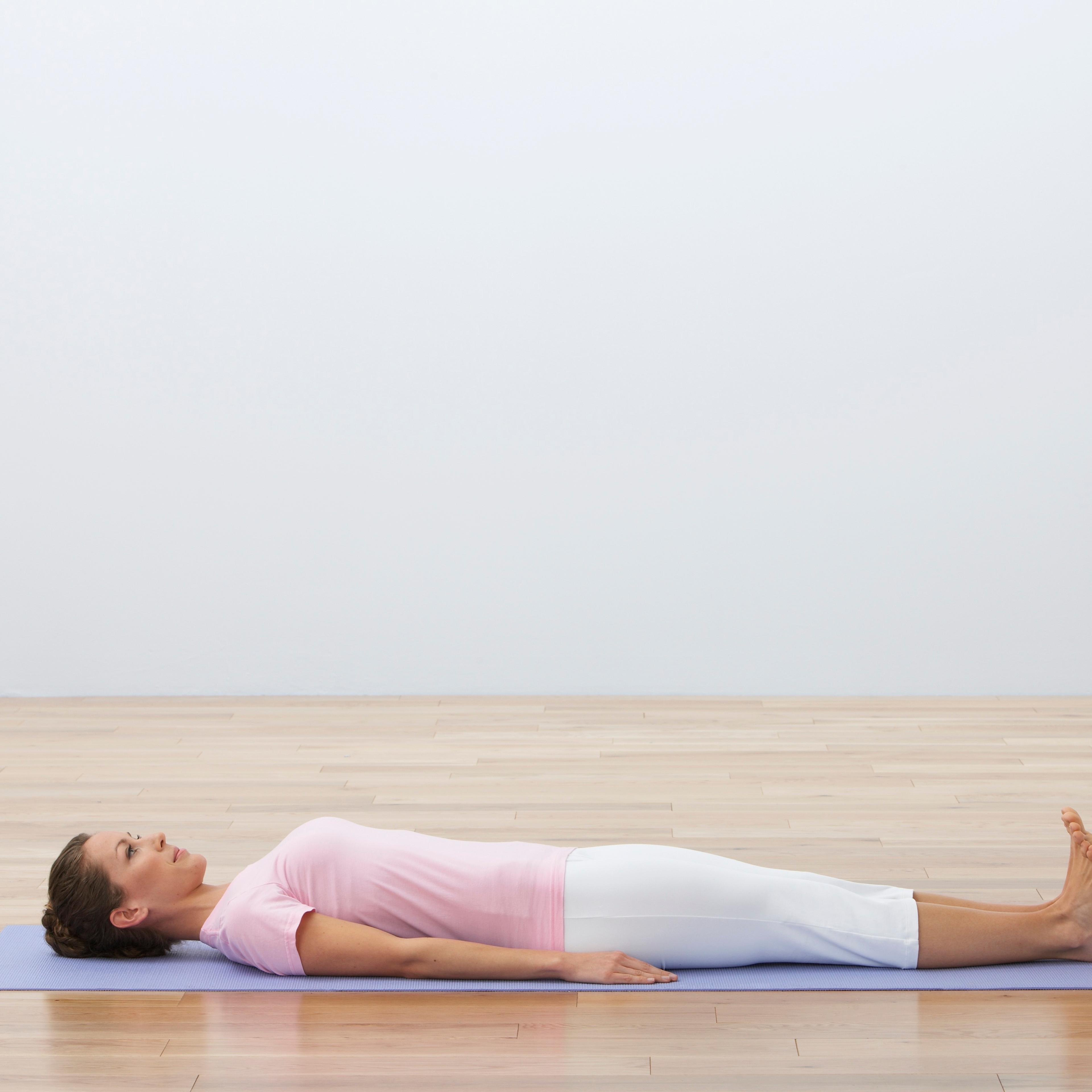woman-lying-down-yoga-mat