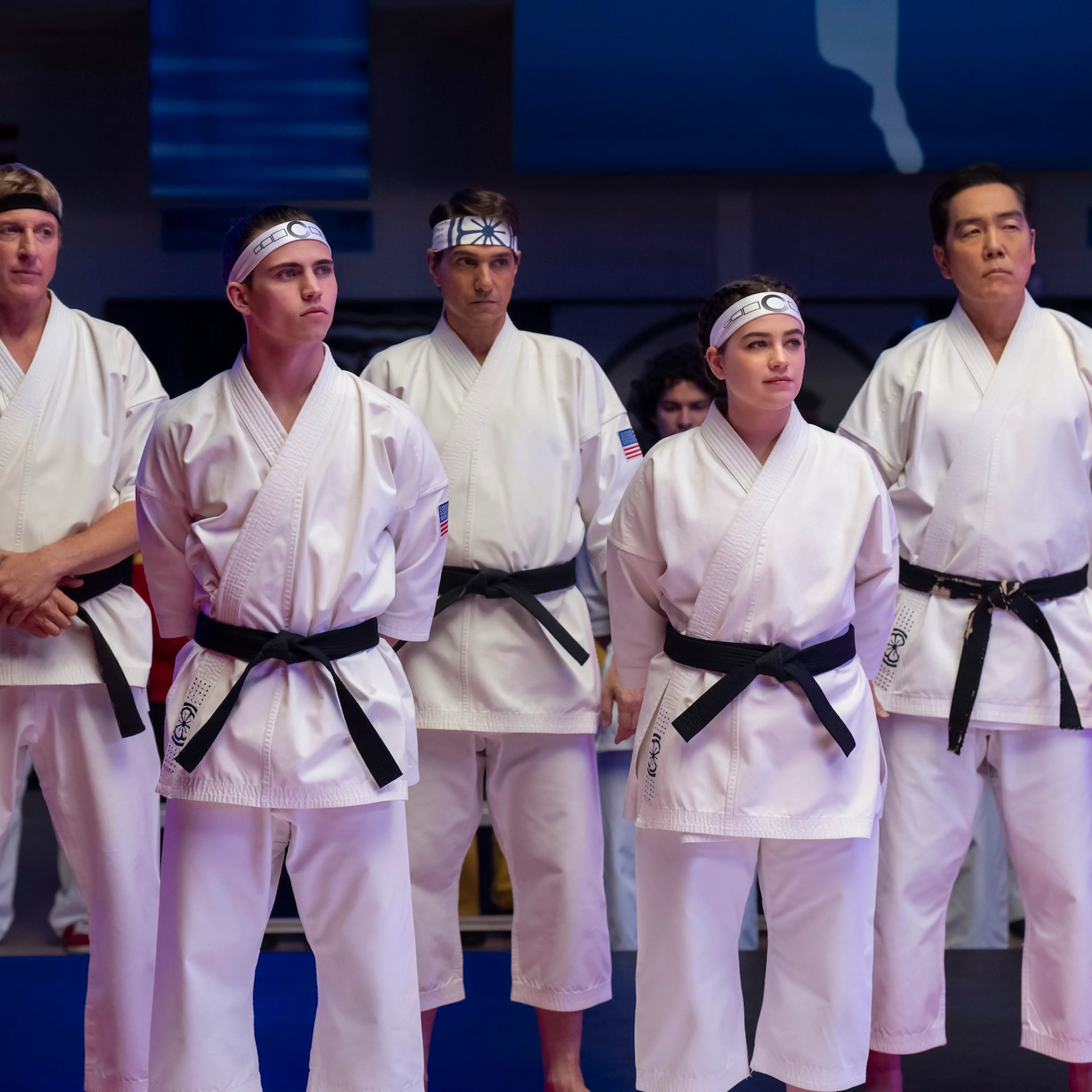 Cobra Kai. (L to R) William Zabka as Johnny Lawrence, Tanner Buchanan as Robby Keene, Ralph Macchio as Daniel LaRusso, Mary Mouser as Samantha LaRusso, Yuji Okumoto as Chozen in Cobra Kai. Cr. Curtis Bonds Baker/Netflix © 2024