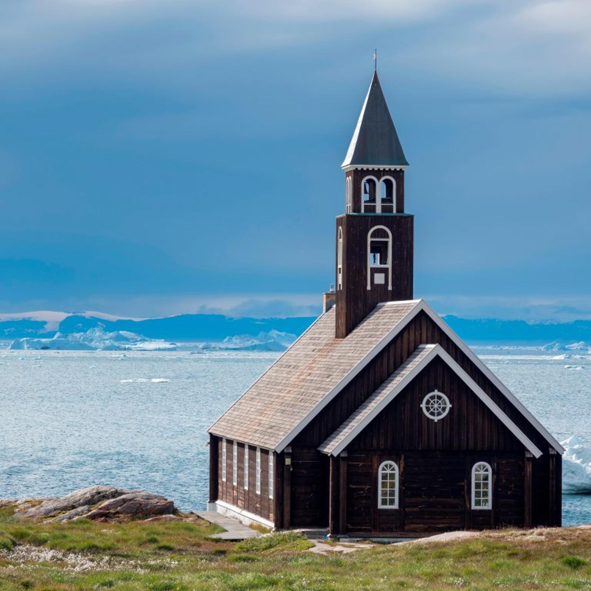 Zions church. Town Ilulissat at the shore of Disko Bay in West Greenland. center for tourism. administration and economy. The icefjord nearby is listed as UNESCO world heritage. America. North America.
