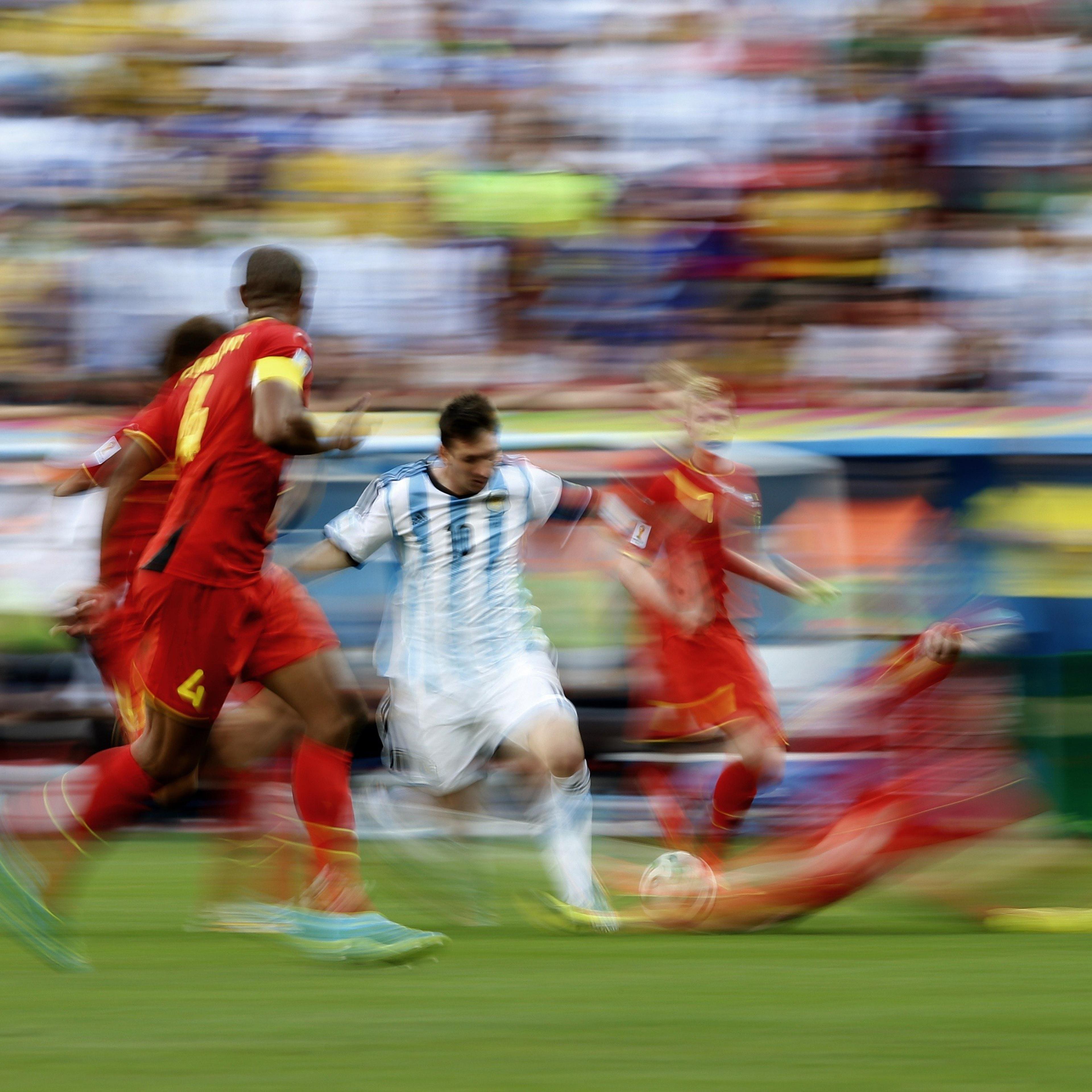 Argentina's Lionel Messi vies for the ball during a quarter-final football match between Argentina and Belgium at the Mane Garrincha National Stadium in Brasilia during the 2014 FIFA World Cup on July 5, 2014.