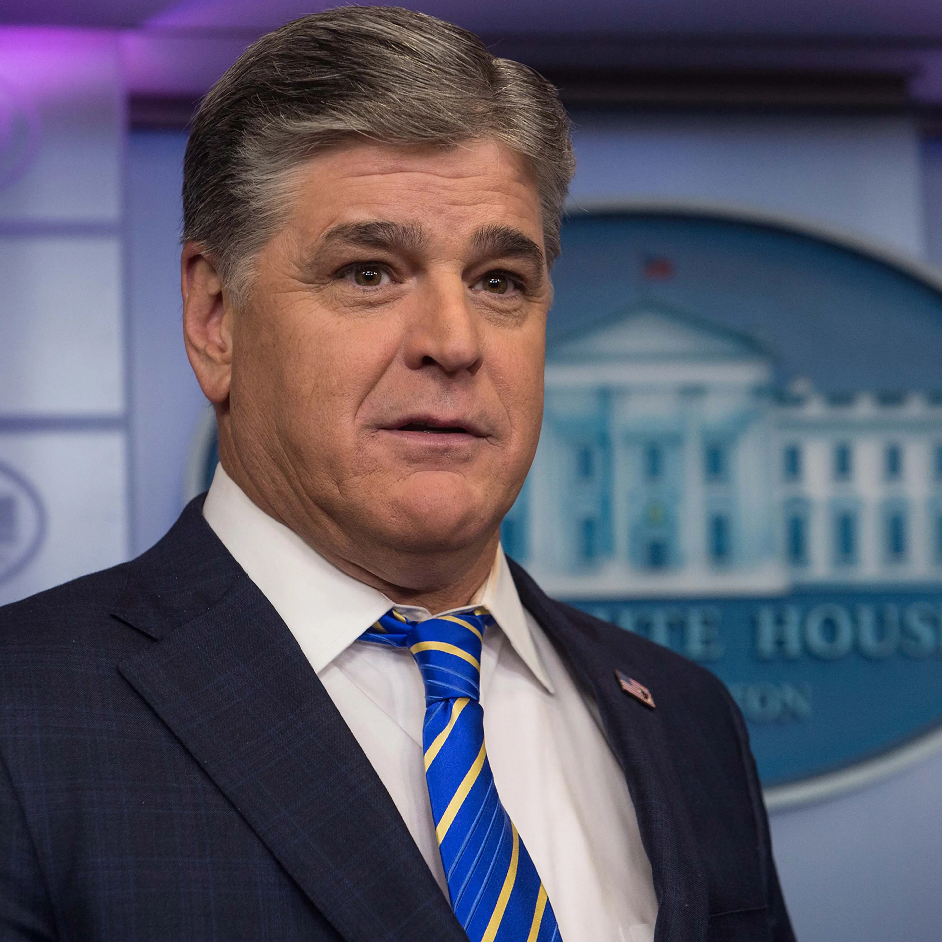 Fox News host Sean Hannity is seen in the White House briefing room