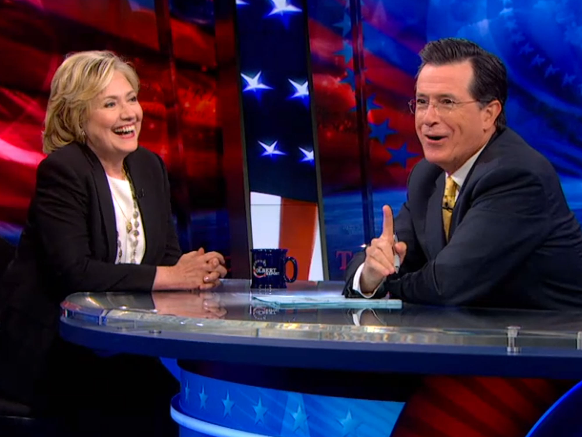Hillary Clinton drops in on the <i>Colbert Report</i>.