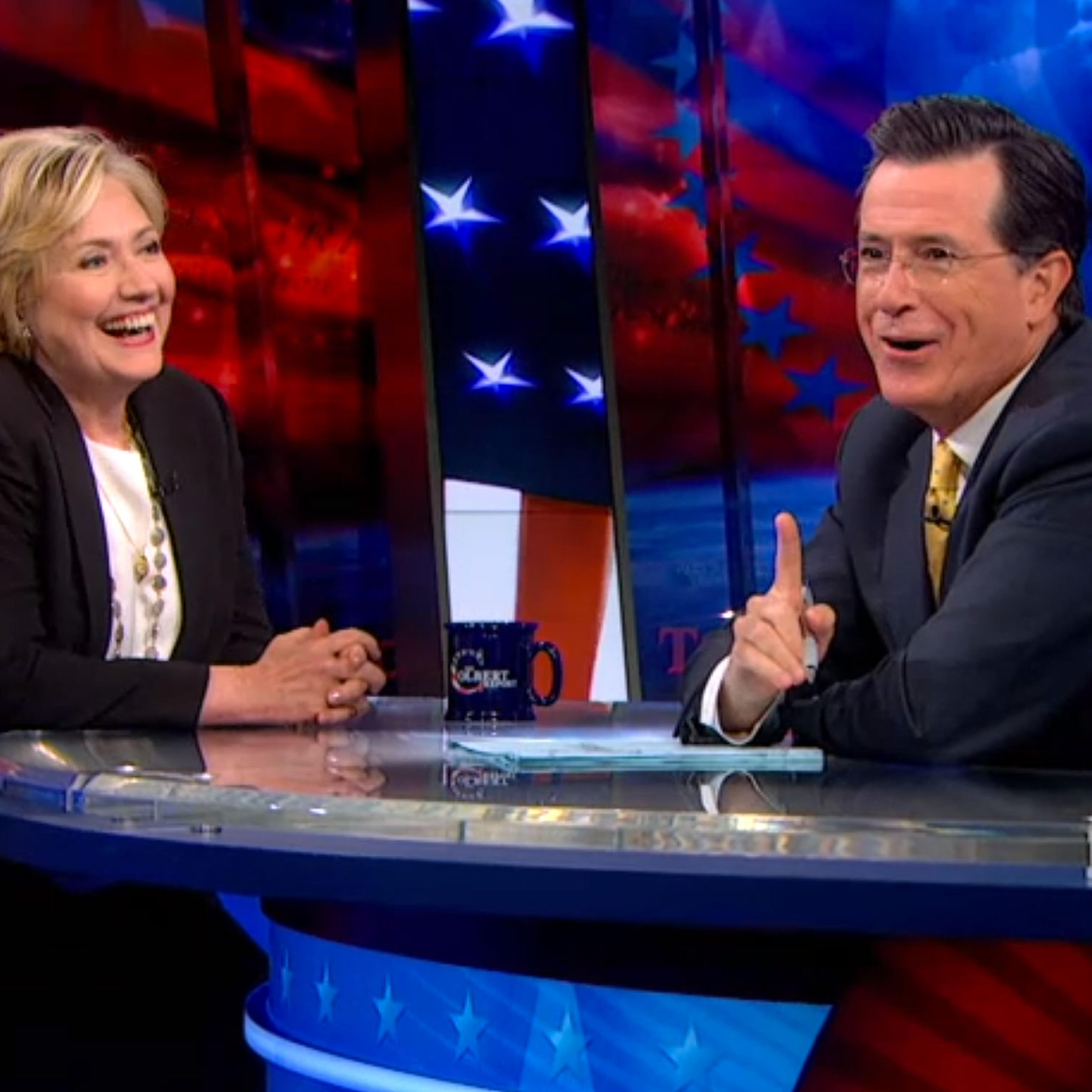 Hillary Clinton drops in on the <i>Colbert Report</i>.