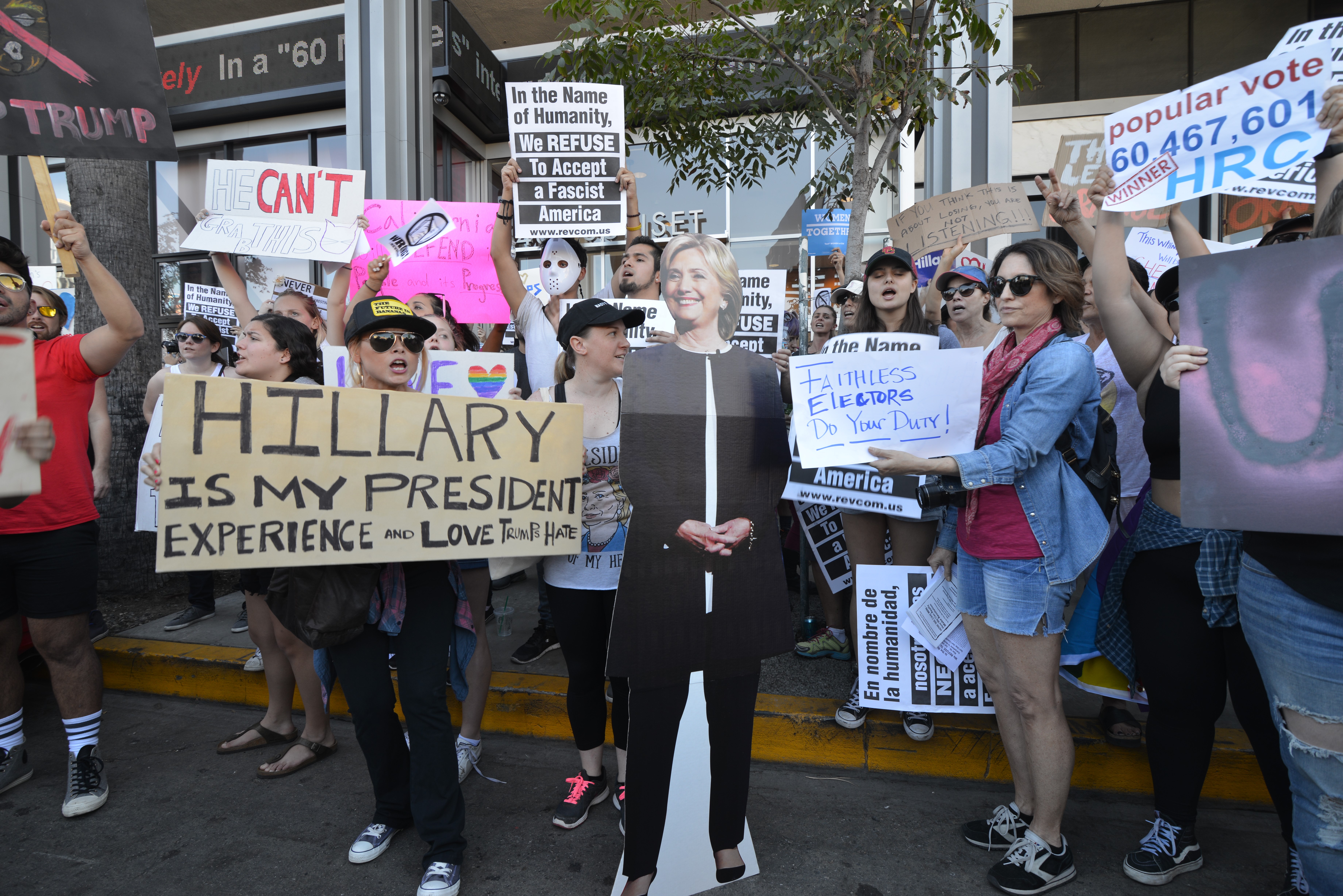 People stage a protest against President-elect Donald Trump of Republican Party in front of CNN building in Hollywood, Los Angeles on Nov. 14, 2016.