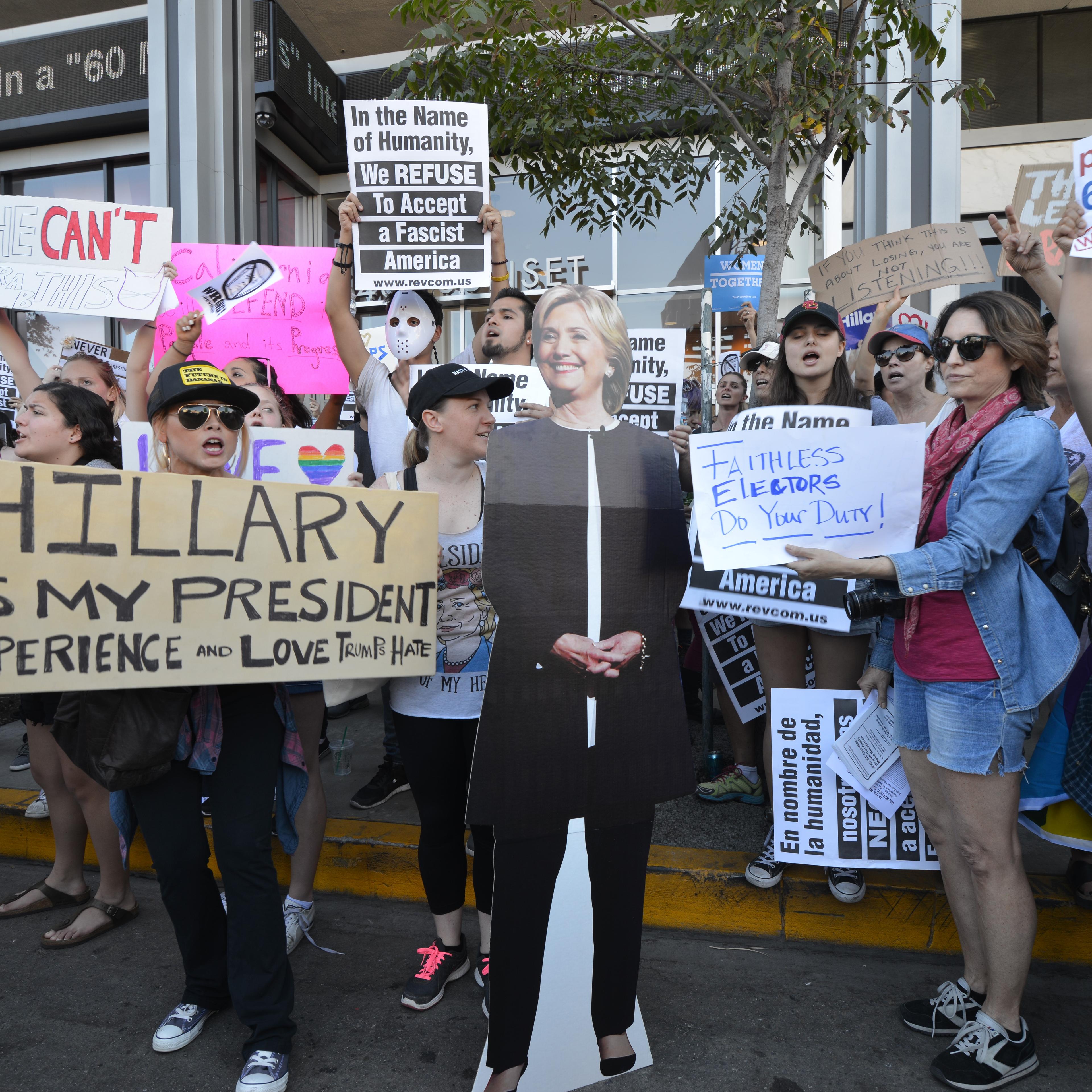 People stage a protest against President-elect Donald Trump of Republican Party in front of CNN building in Hollywood, Los Angeles on Nov. 14, 2016.