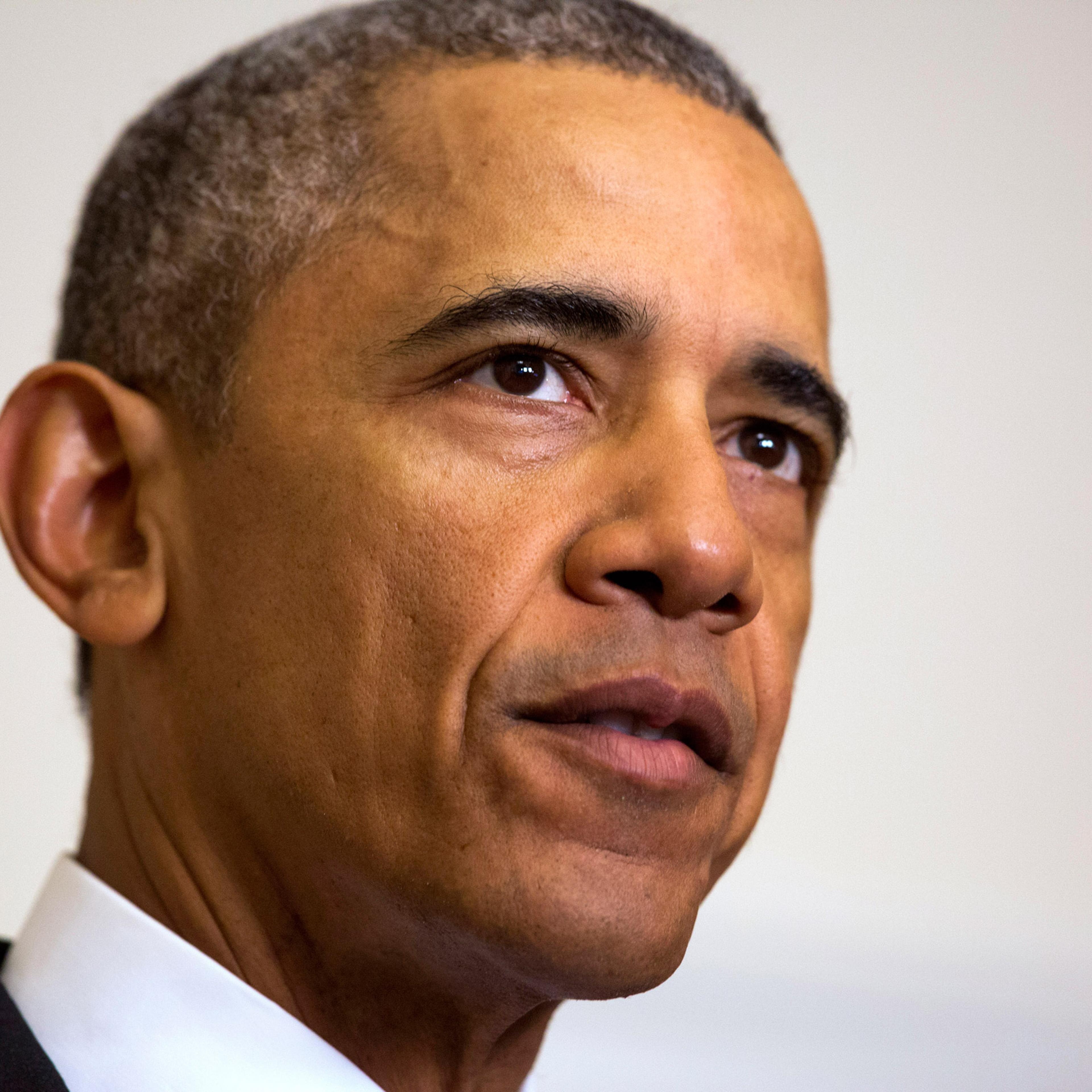 President Barack Obama speaks about the release of Americans by Iran, Sunday, Jan. 17, 2016 in the Cabinet Room of the White House in Washington. (AP Photo/Jacquelyn Martin)