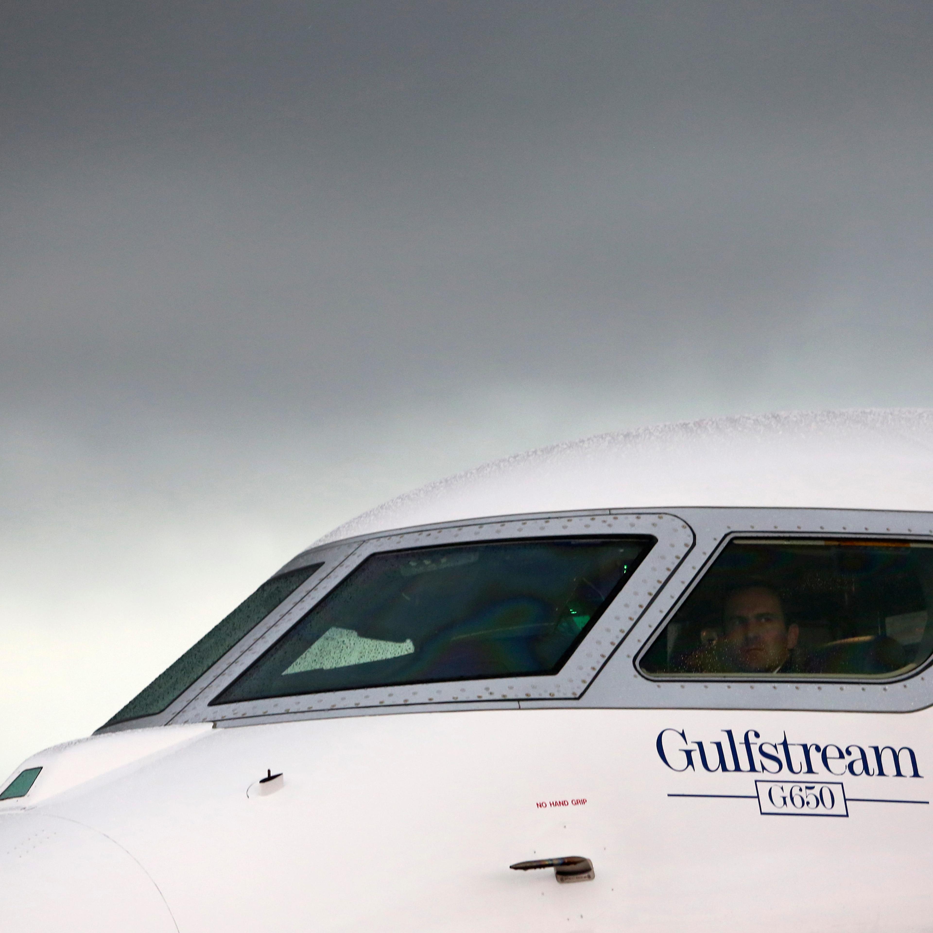 A logo sits beneath the cockpit window of a Gulfstream G650 business jet, manufactured by General Dynamics Corp., on the first day of the Paris Air Show in Paris on June 17, 2013.
