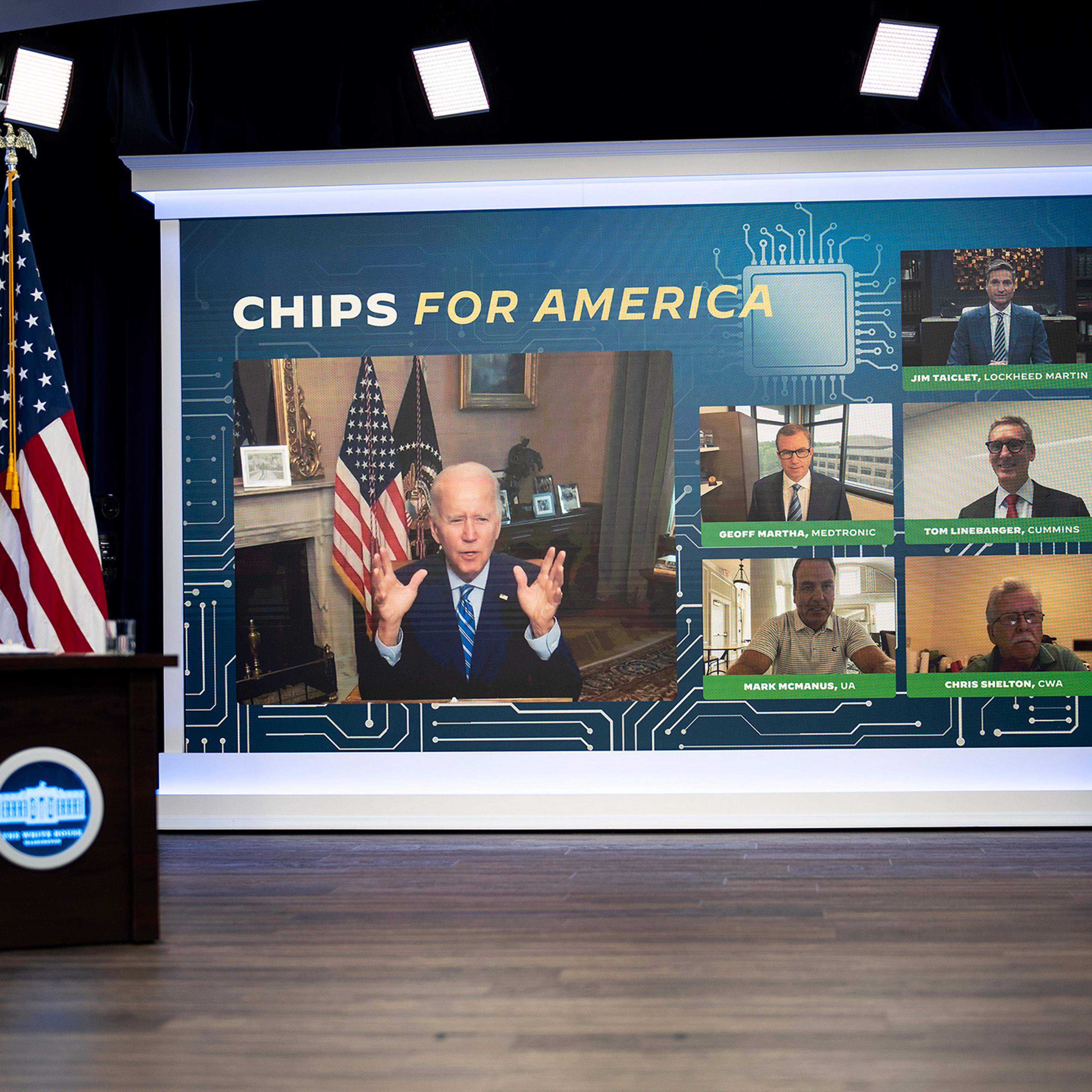 President Joe Biden is seen on a screen during a meeting with business leaders to discuss the CHIPS Act, at the White House in Washington, D.C. on July 25, 2022.