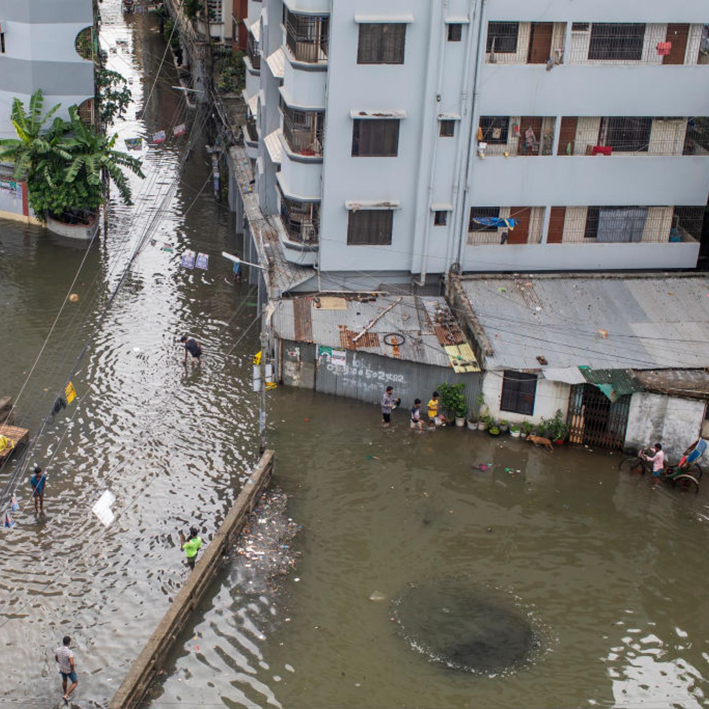 General view of a waterlogged Dhaka street following heavy