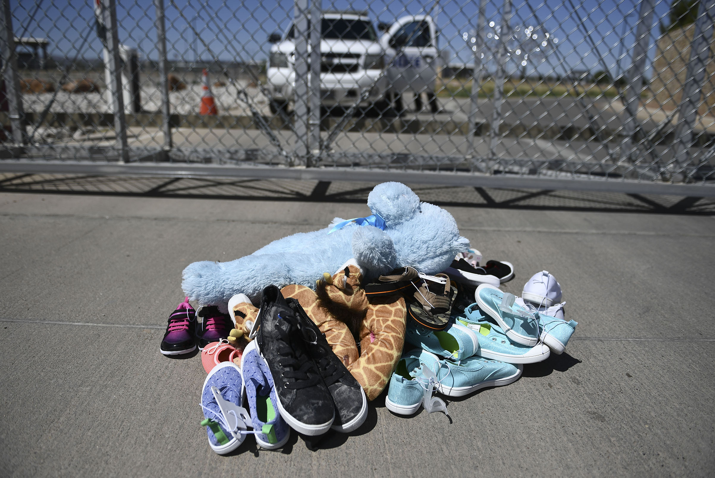 Shoes and toys for immigrant children are left at the Tornillo Port of Entry near El Paso, Texas, June 21, 2018.