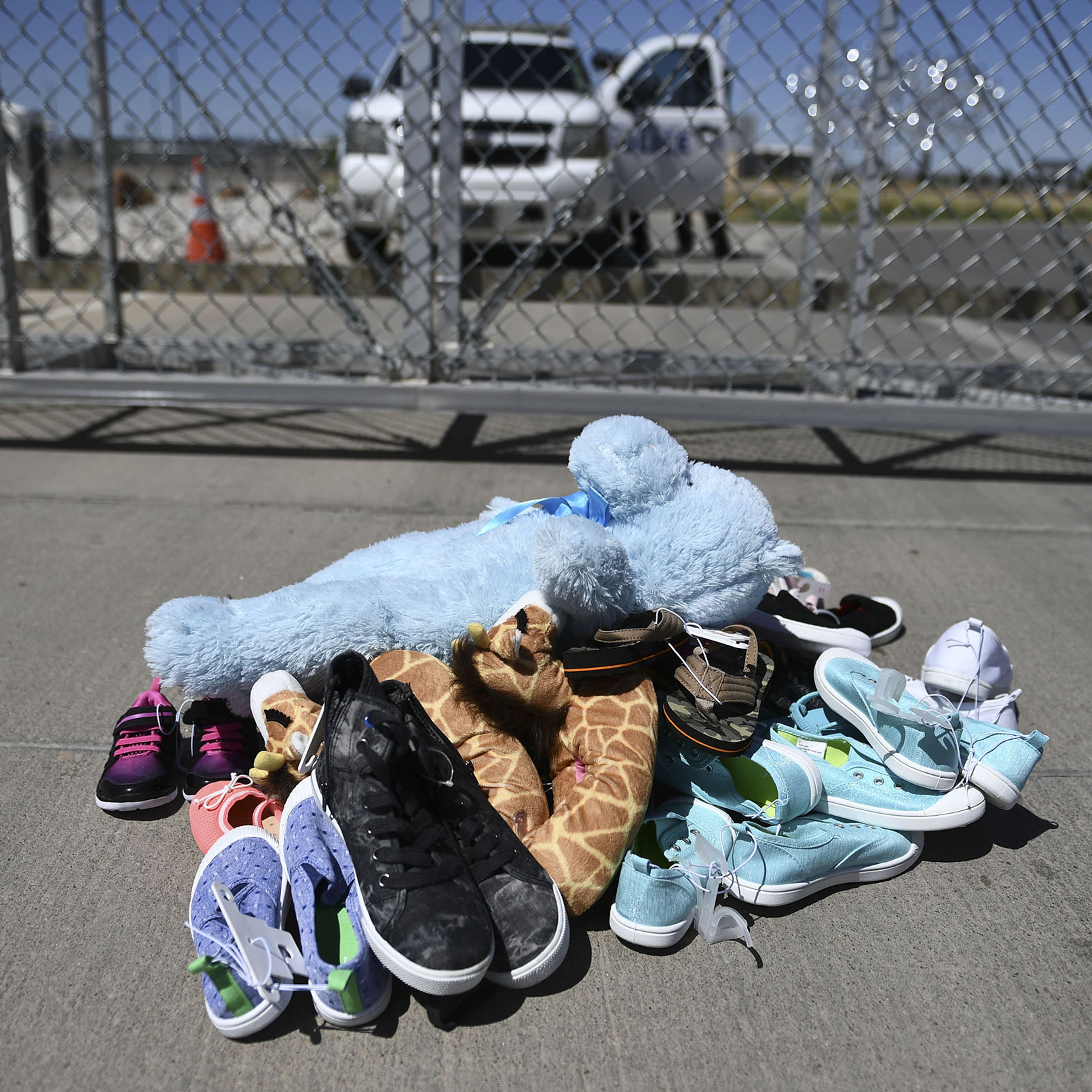 Shoes and toys for immigrant children are left at the Tornillo Port of Entry near El Paso, Texas, June 21, 2018.
