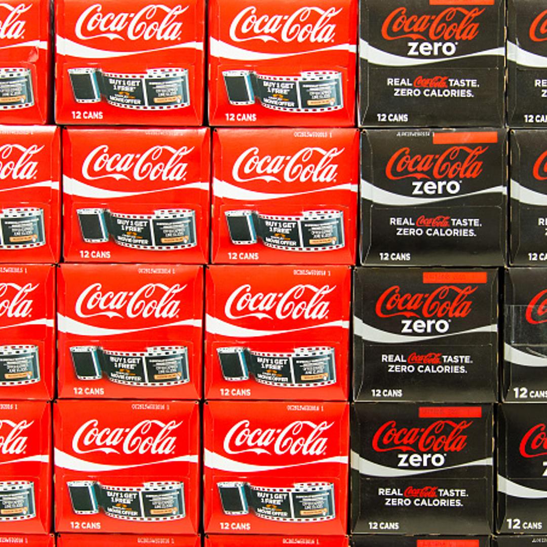 Stacks Coca Cola Zero and Coca Cola Diet can boxes in a