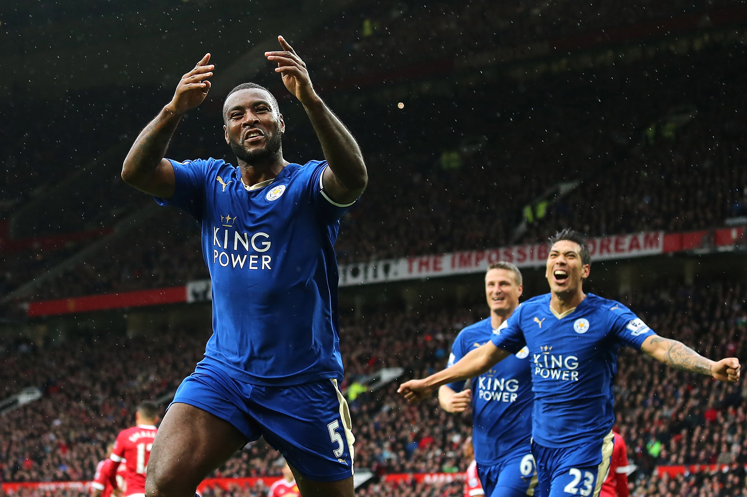 MANCHESTER, ENGLAND - MAY 01: Wes Morgan of Leicester City celebrates scoring a goal to make the score 1-1 during the Barclays Premier League match between Manchester United and Leicester City at Old Trafford on May 1, 2016 in Manchester, United Kingdom.