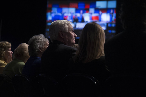 Attendees listen to the Republican presidential candidate debate at the North Charleston Coliseum in North Charleston, South Carolina, U.S., on Thursday, Jan. 14, 2016.