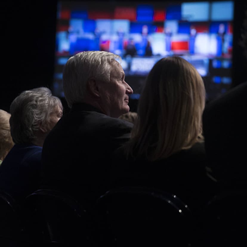 Attendees listen to the Republican presidential candidate debate at the North Charleston Coliseum in North Charleston, South Carolina, U.S., on Thursday, Jan. 14, 2016.