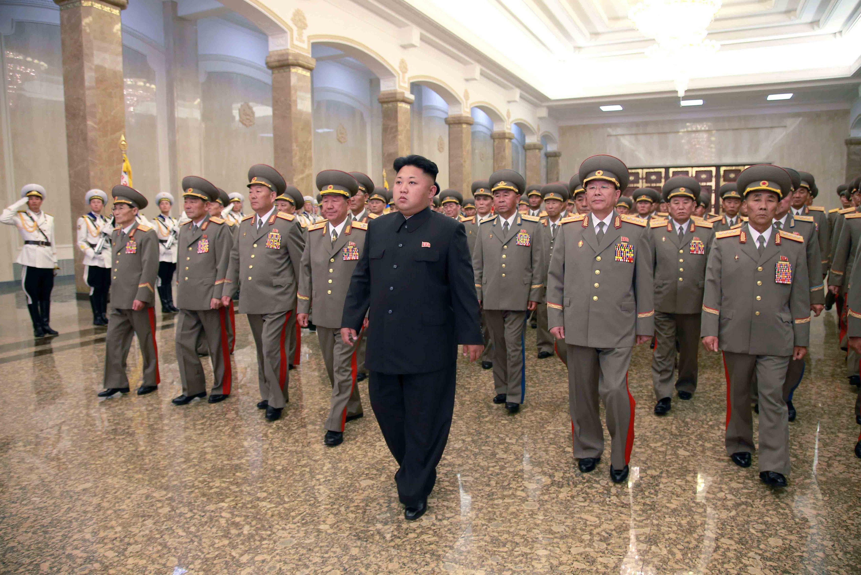 North Korean leader Kim Jong Un visits the Kumsusan Palace of the Sun in Pyongyang at midnight on July 8, 2014.