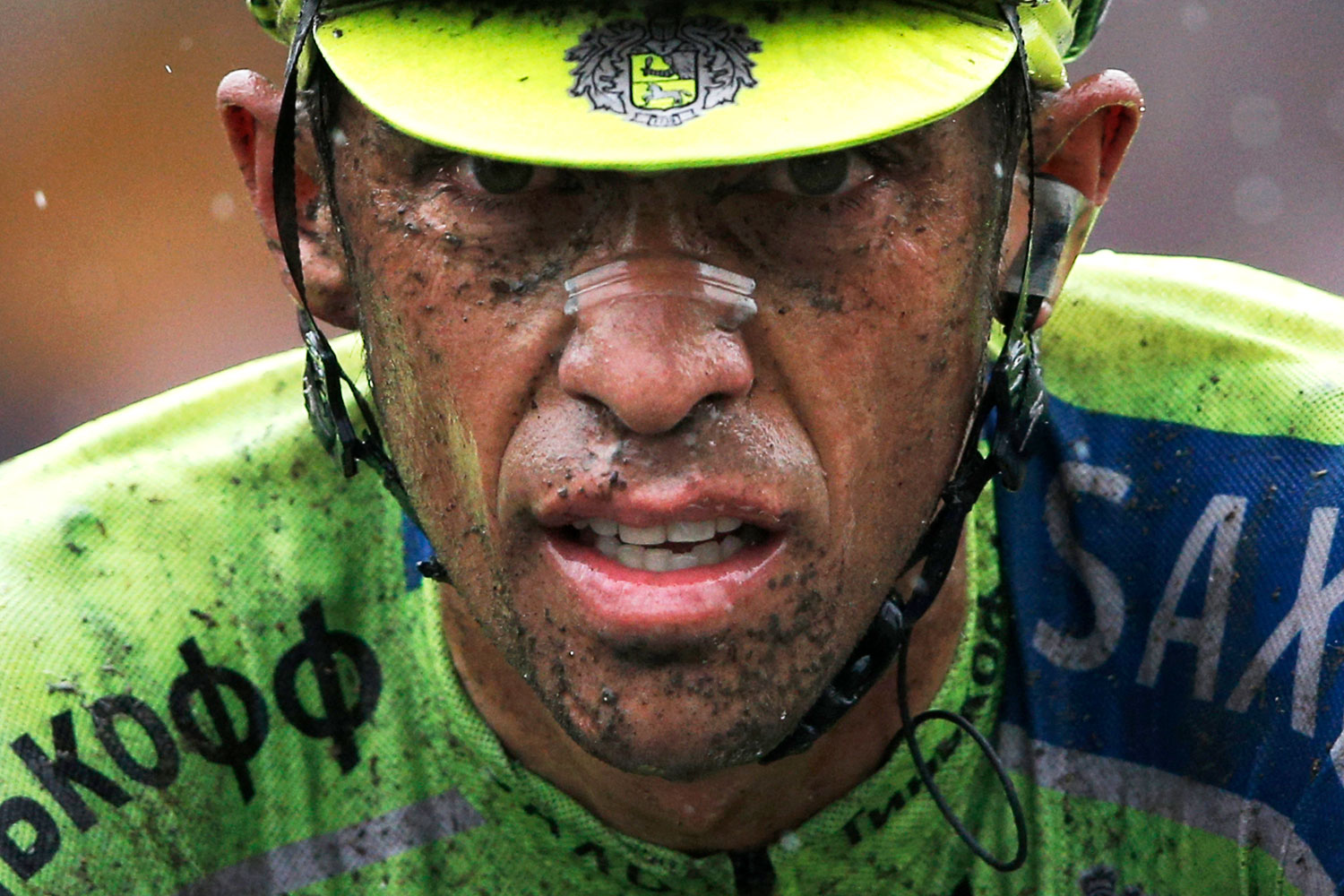 Spain's Alberto Contador crosses the finish line with a delay of more than two minutes on his main rivals during the fifth stage of the Tour de France cycling in Arenberg, France on July 9, 2014.