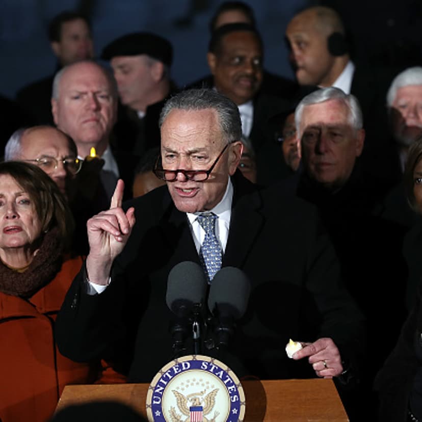 Senate Minority Leader Chuck Schumer (D-NY) and House Minority Leader Nancy Pelosi (D-CA) lead members of Congress during a protest on the steps of the U.S. Supreme Court January 30, 2017 in Washington, D.C.
