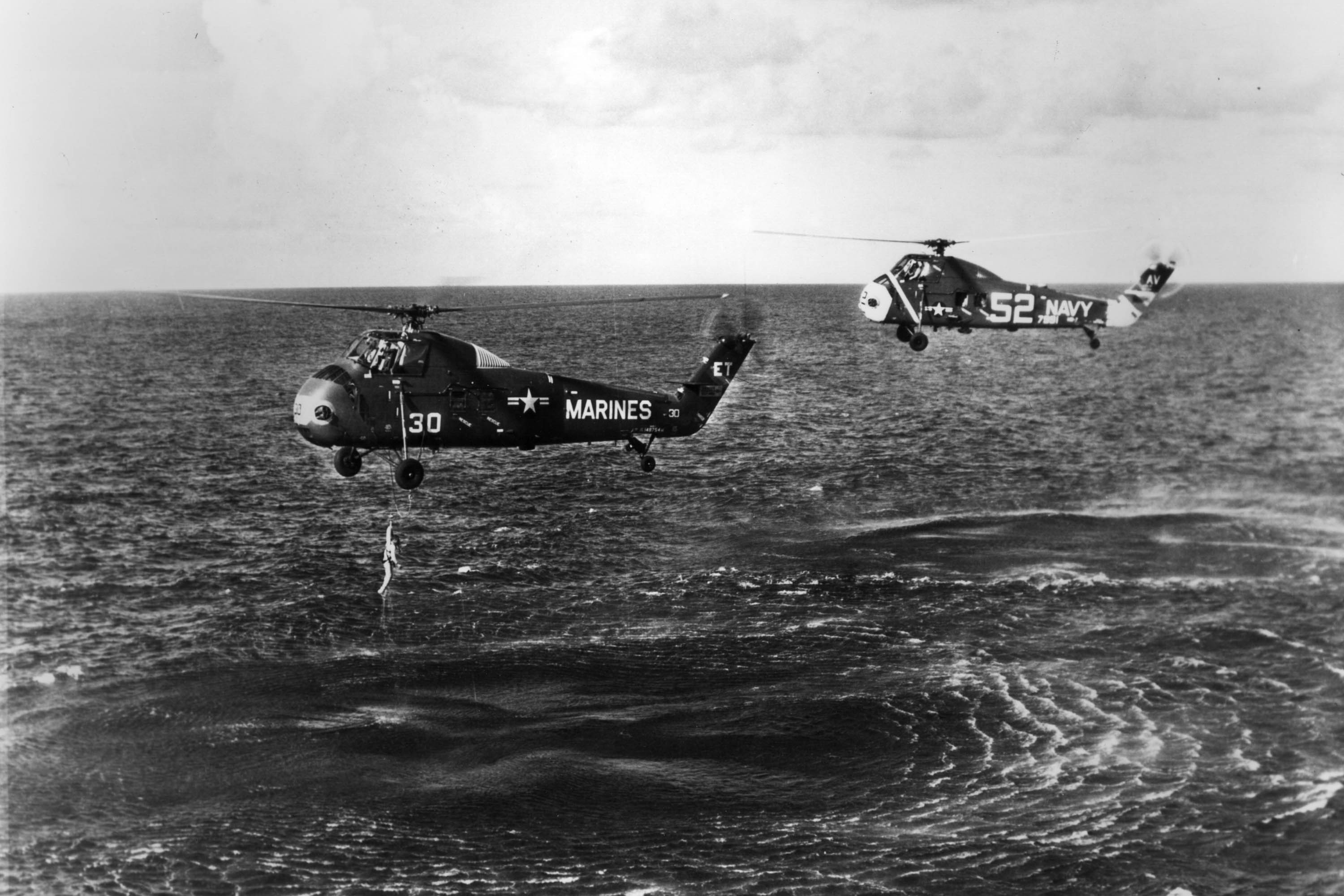 July 21, 1961, Worldwide Mercury Astronaut Virgil 'Gus' Grissom Is Pulled From The Ocean. His Spce Capsule 'Liberty Bell 7' Sank After He Opened The Side Hatch. 