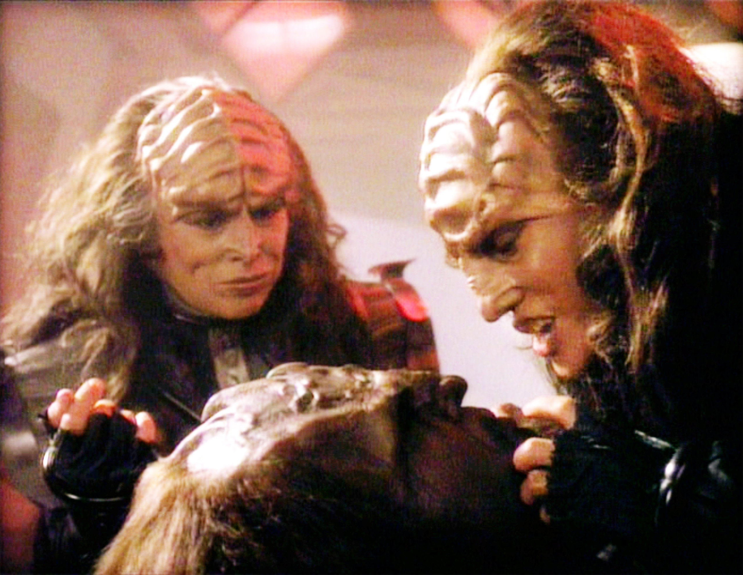 Star Trek: The Next Generation episode, 'Redemption II,' featuring (from left) Barbara March as Lursa and Gwynyth Walsh as B'Etor (the Duras sisters, Klingon). B'Etor faces Worf (played by Michael Dorn). Episode originally broadcast on September 21, 1991