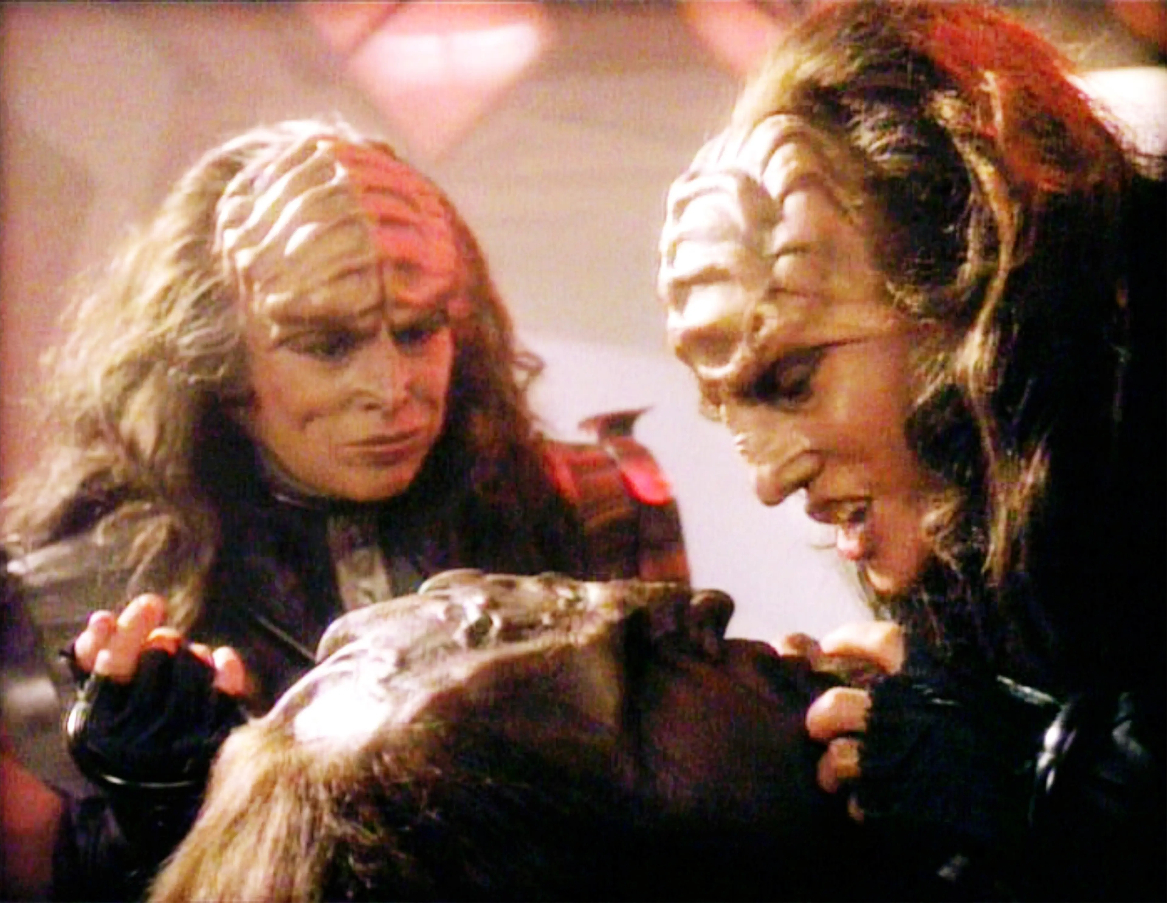 Star Trek: The Next Generation episode, 'Redemption II,' featuring (from left) Barbara March as Lursa and Gwynyth Walsh as B'Etor (the Duras sisters, Klingon). B'Etor faces Worf (played by Michael Dorn). Episode originally broadcast on September 21, 1991