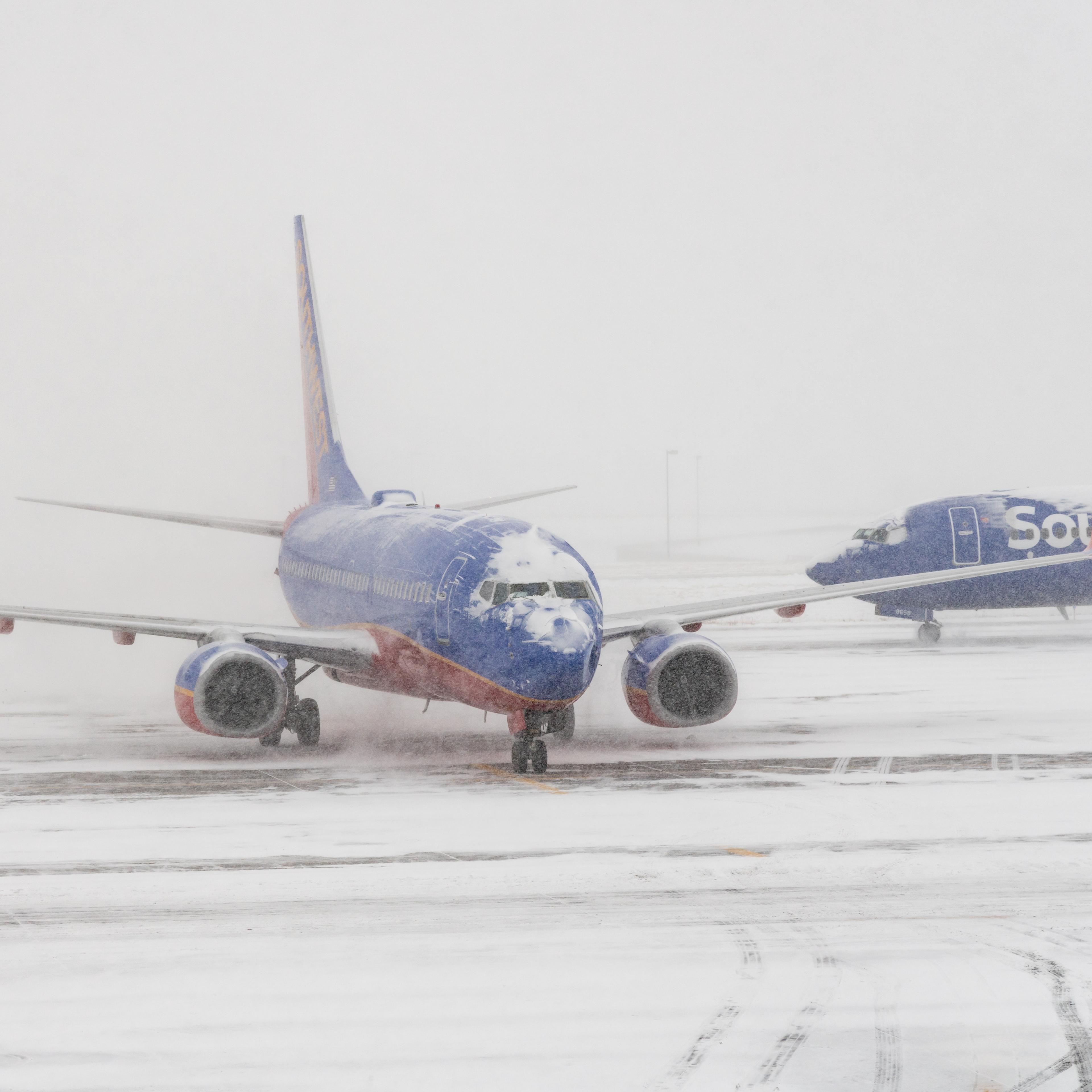 Southwest aircraft on the runway during snow storm in Denver
