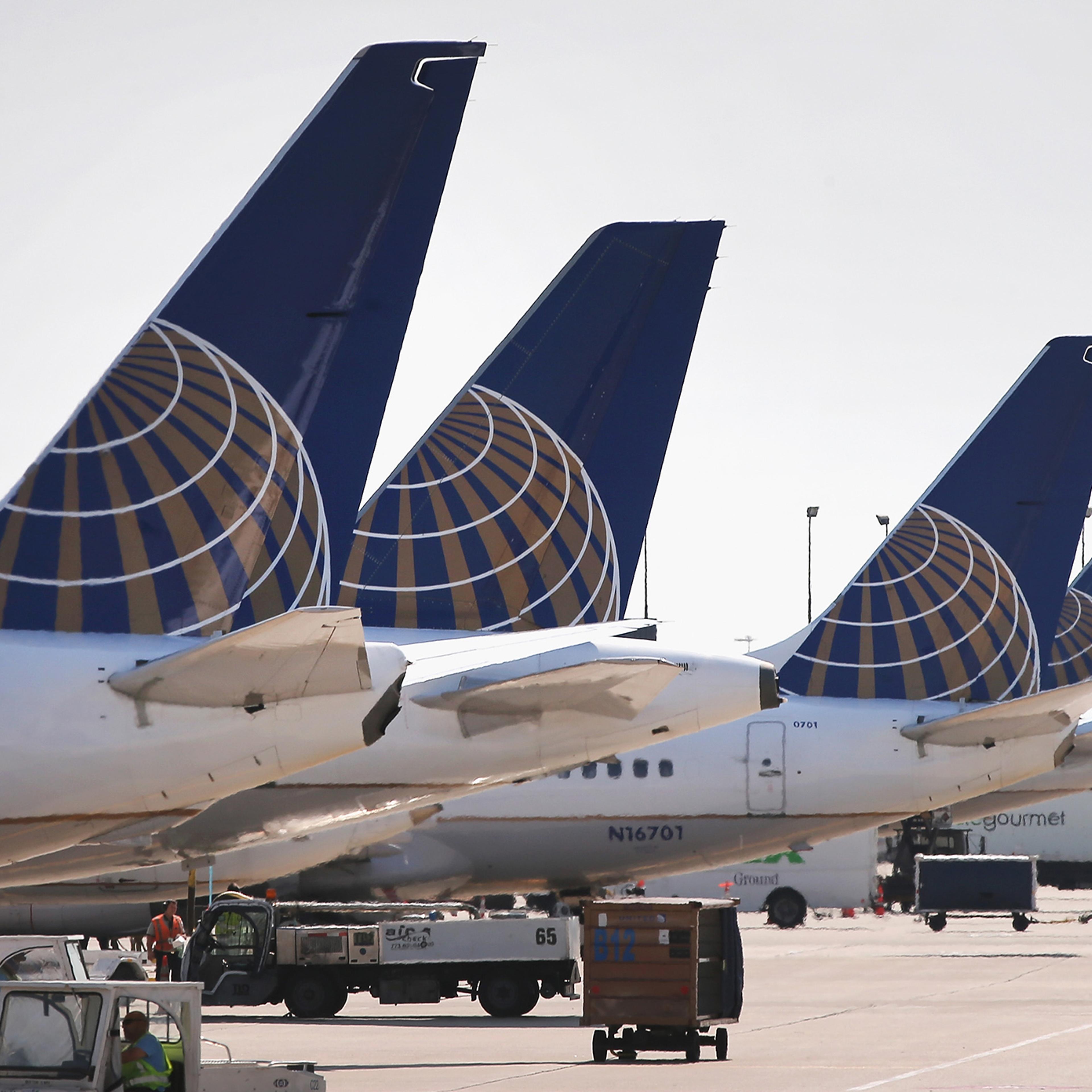United Airlines jets sit at gates at O'Hare International Airport on September 19, 2014 in Chicago, Illinois.