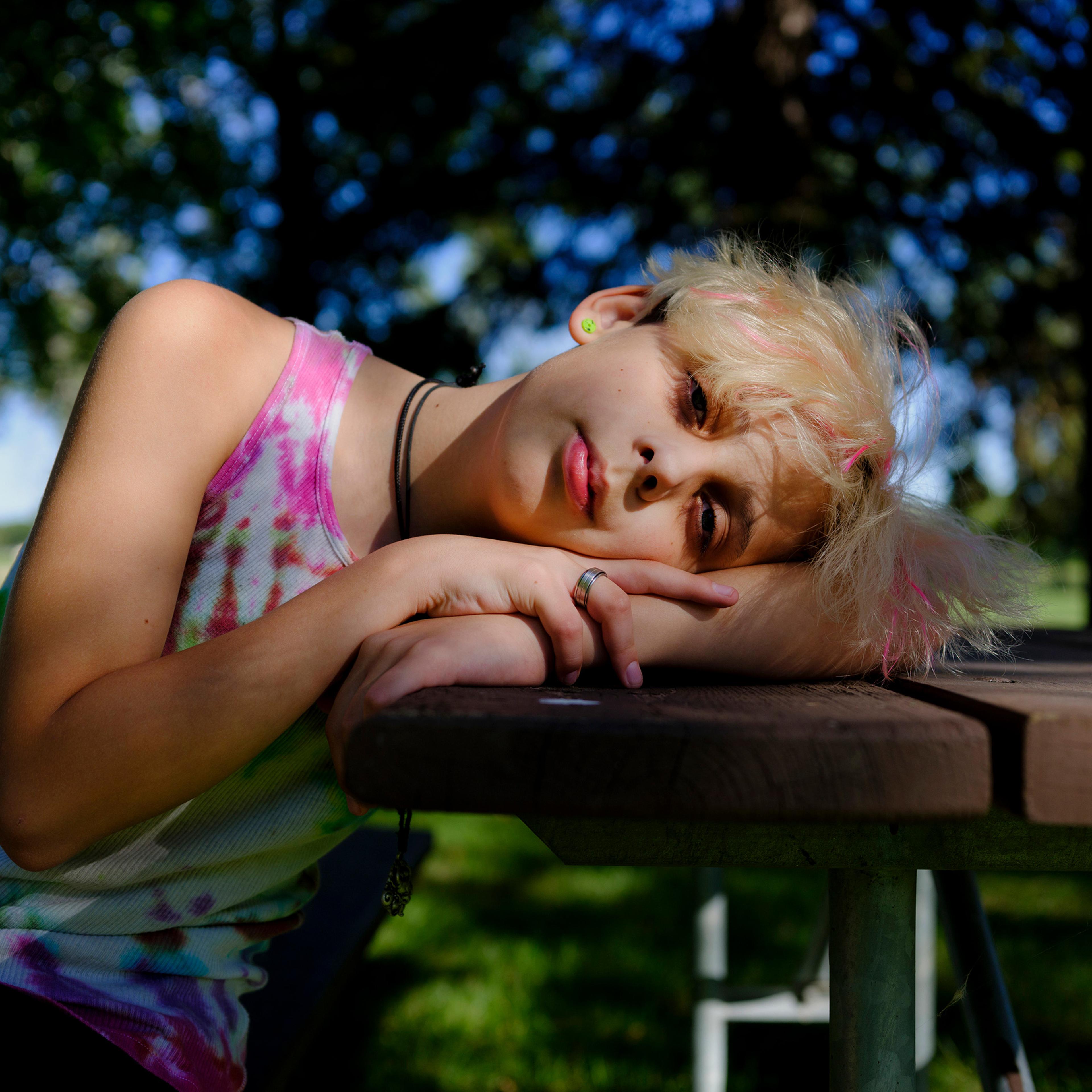 Freedom, a two-spirit 13-year-old, poses for a portrait in Watertown, S.D. At last year’s Pride parade, he dressed up as Freddie Mercury; this year, he wants to dress as a rainbow king. The past year hasn’t been easy, and he’s had to deal with bullies. B