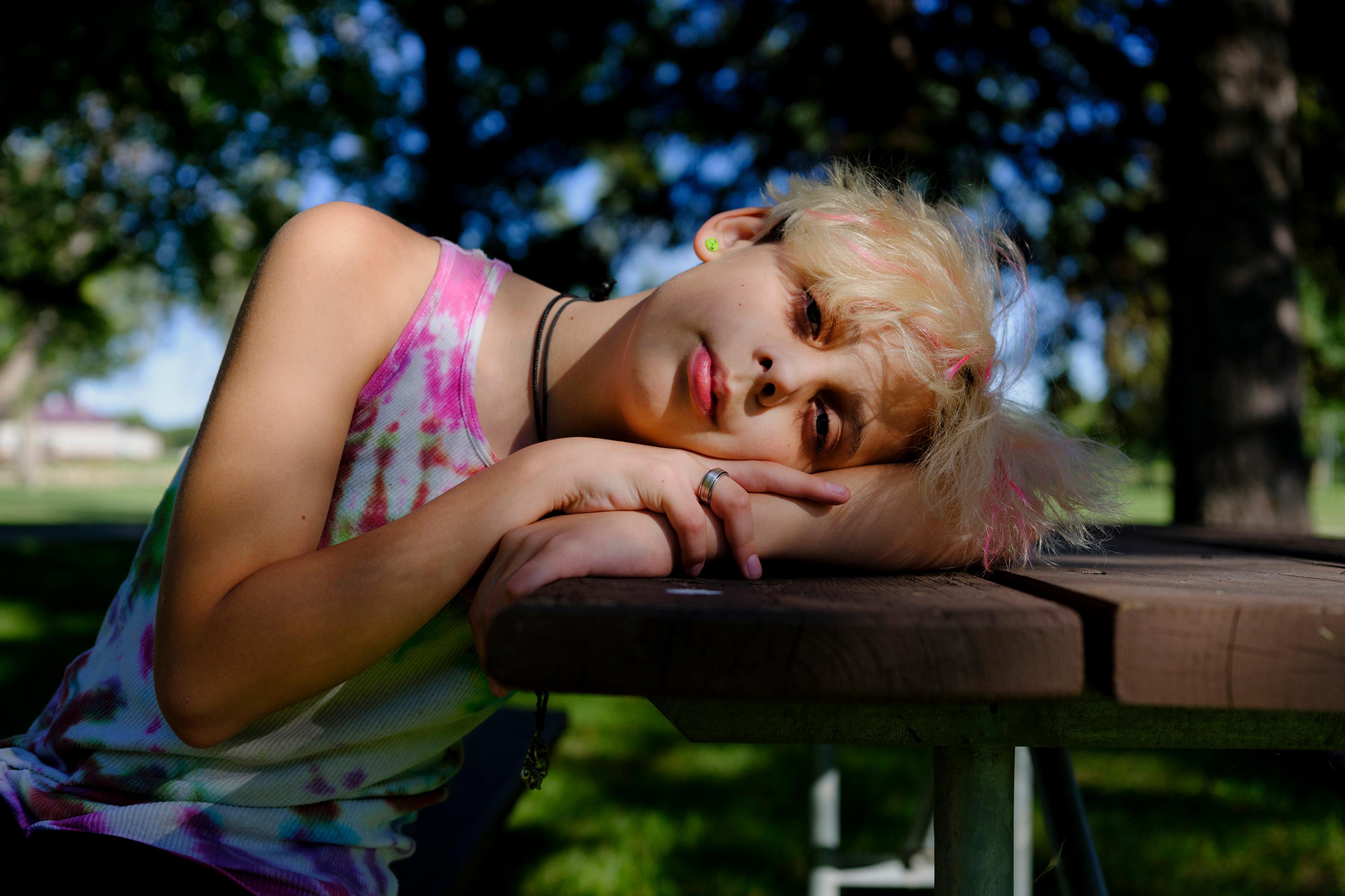 Freedom, a two-spirit 13-year-old, poses for a portrait in Watertown, S.D. At last year’s Pride parade, he dressed up as Freddie Mercury; this year, he wants to dress as a rainbow king. The past year hasn’t been easy, and he’s had to deal with bullies. B