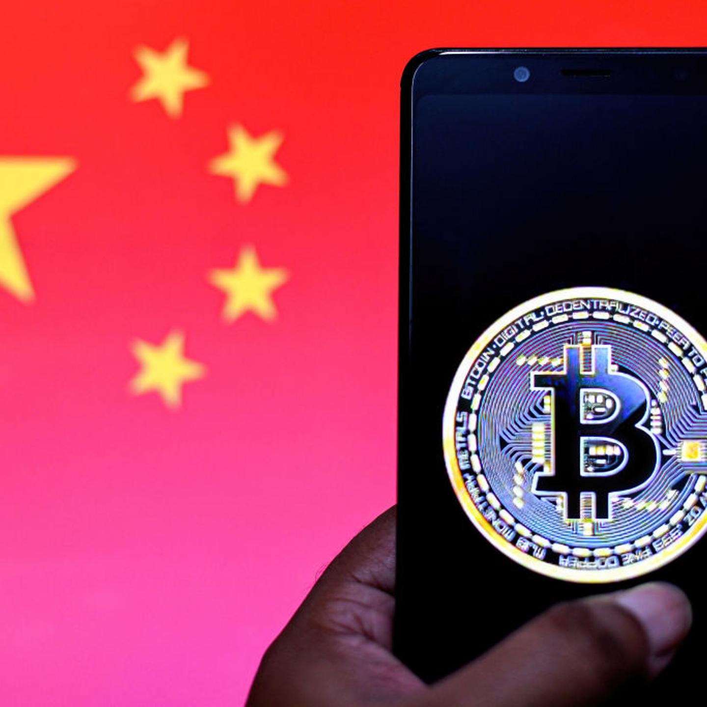 In this Photo illustration a Bitcoin logo seen displayed on
