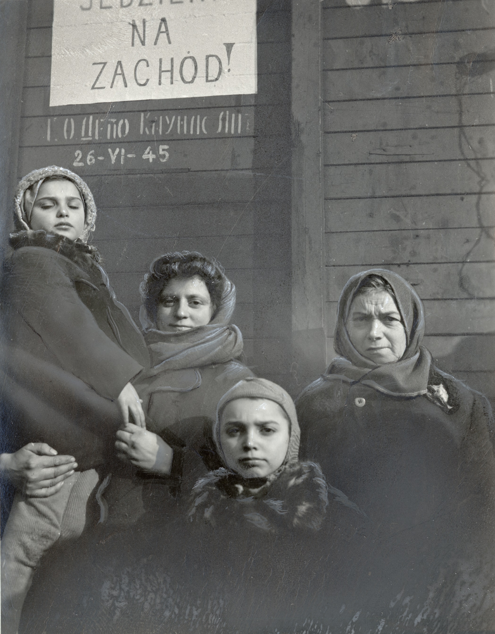 “On to the West” reads the sign on the railroad car in which these Polish Jews were repatriated from the Asiatic region of the USSR, Lower Silesia, 1946. 