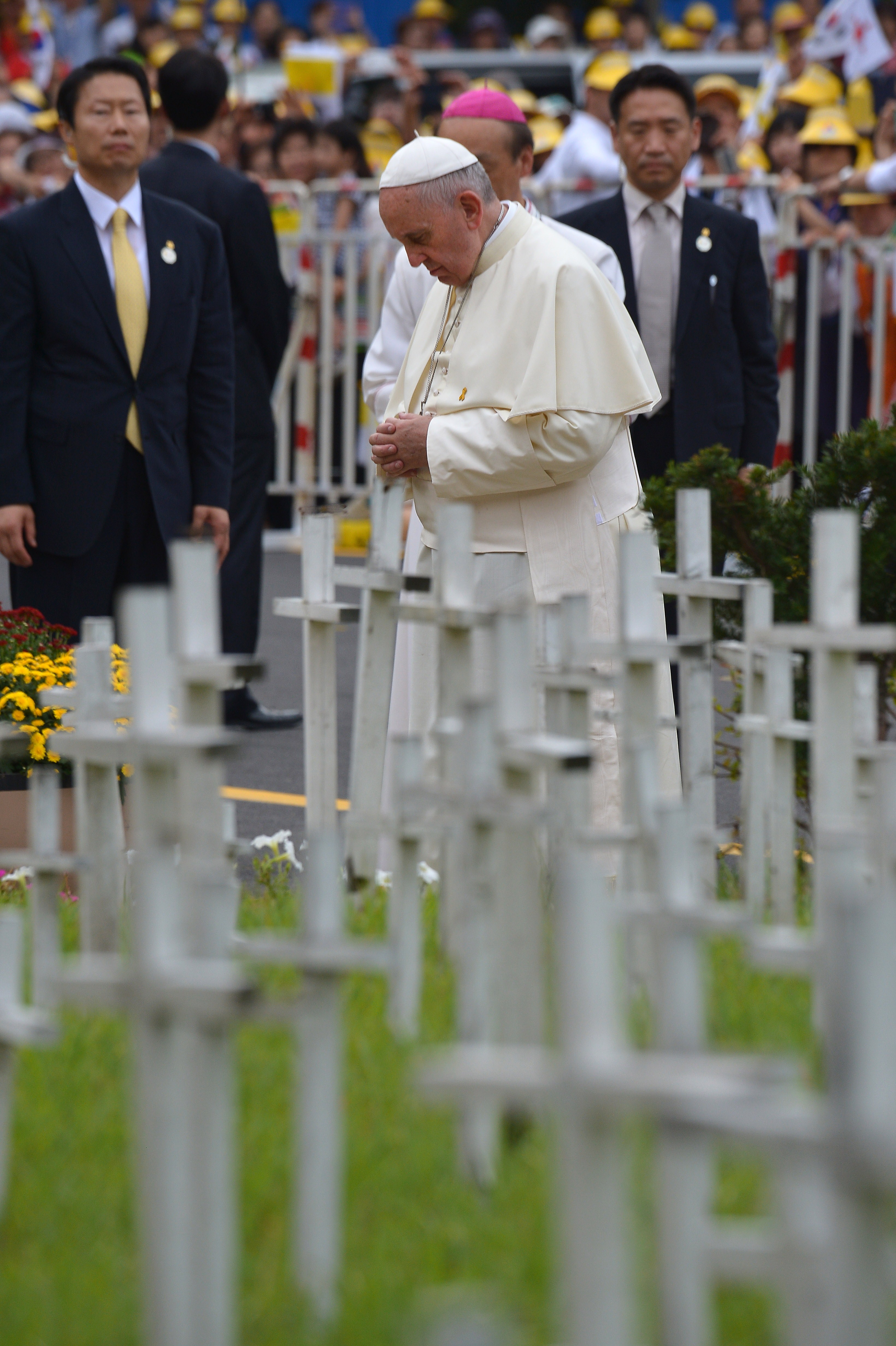Pope Francis stops to pray during a visit to the "garden for aborted babies" in Kkottongnae, around 80 kilometres south of Seoul, on Aug. 16, 2014.