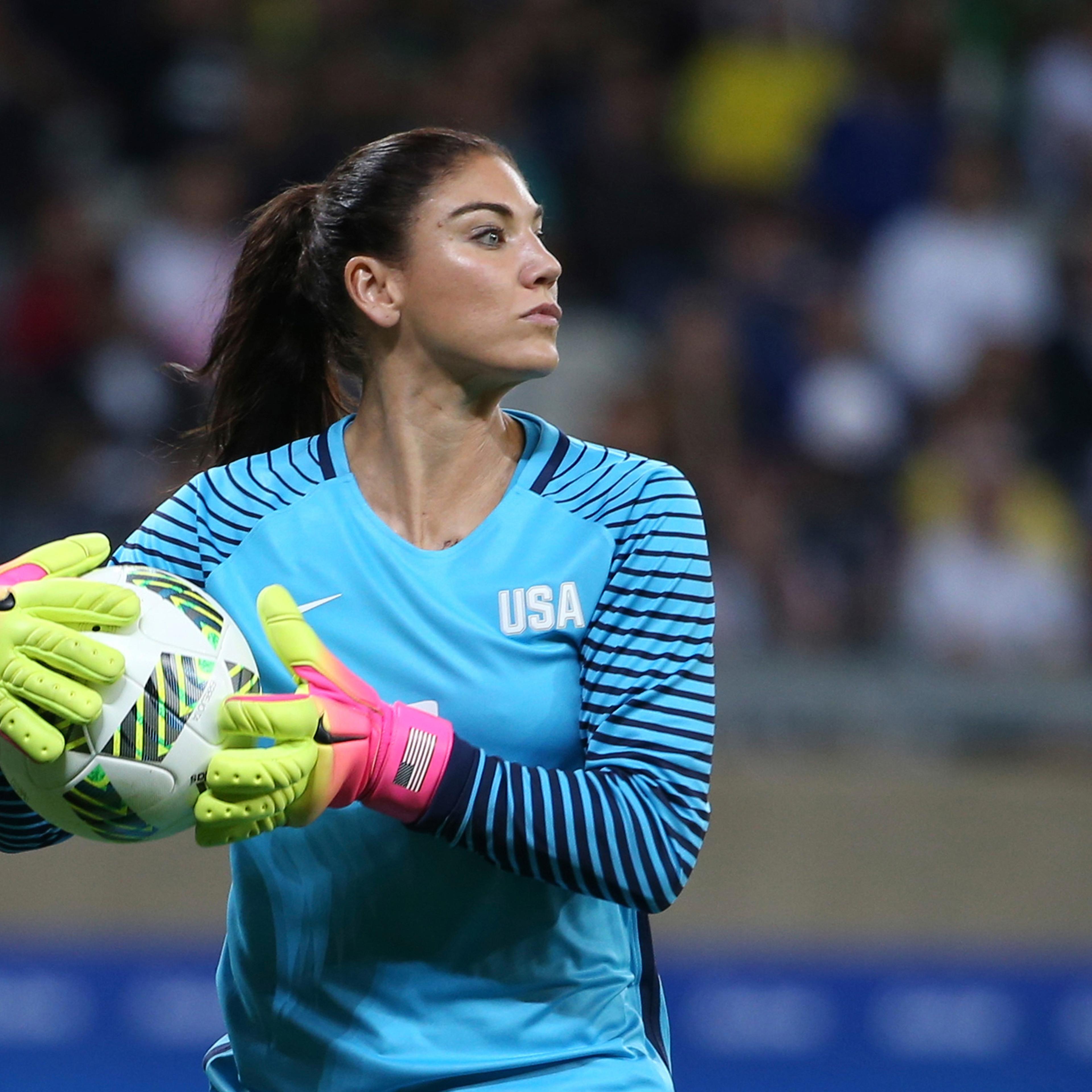 FILE - In this Aug. 3, 2016, file photo, U.S. goalkeeper Hope Solo takes the ball during a women's Olympic football tournament match against New Zealand in Belo Horizonte, Brazil. Solo has been suspended form the team for six months for what U.S. Soccer