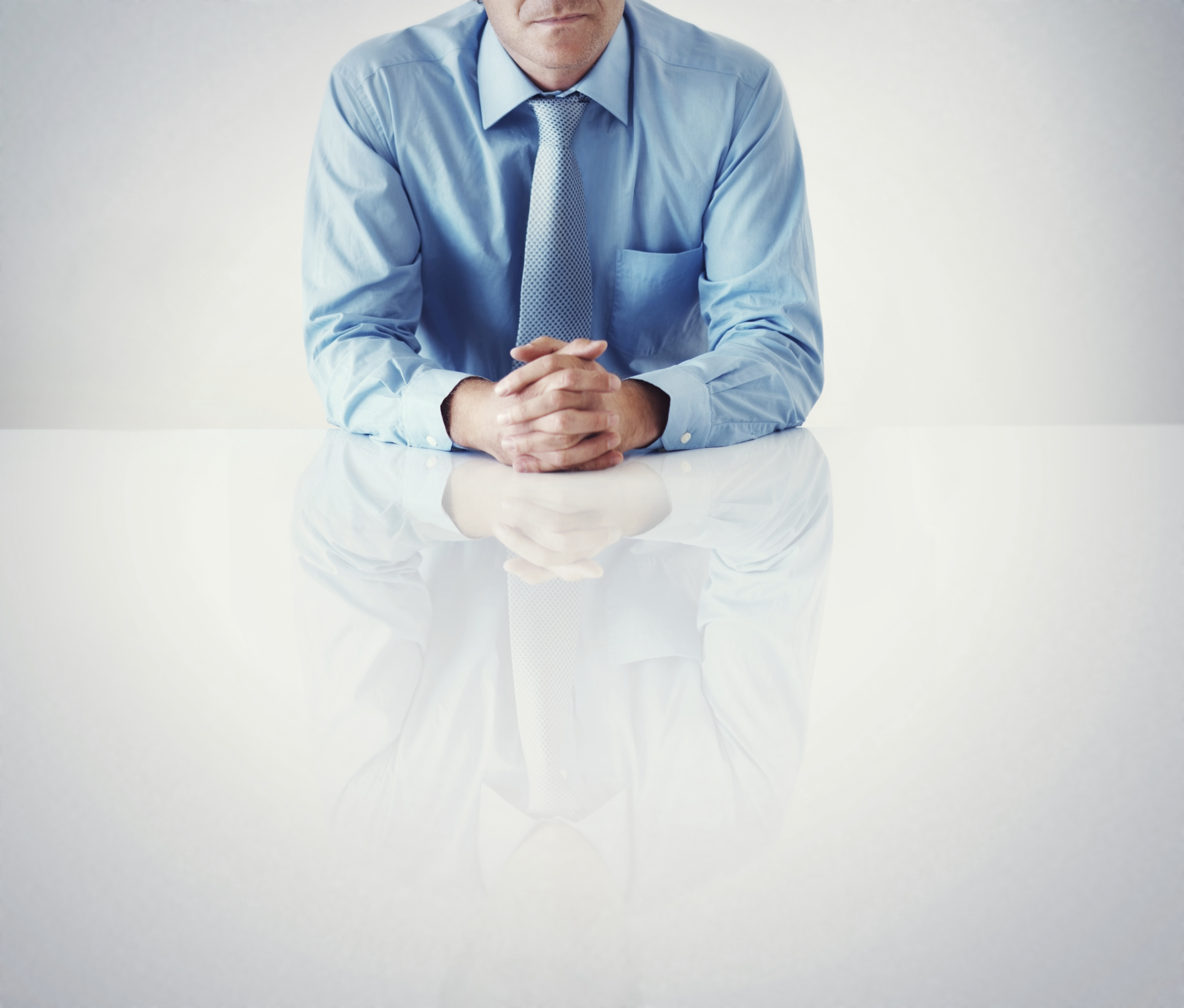 businessman-sitting-desk