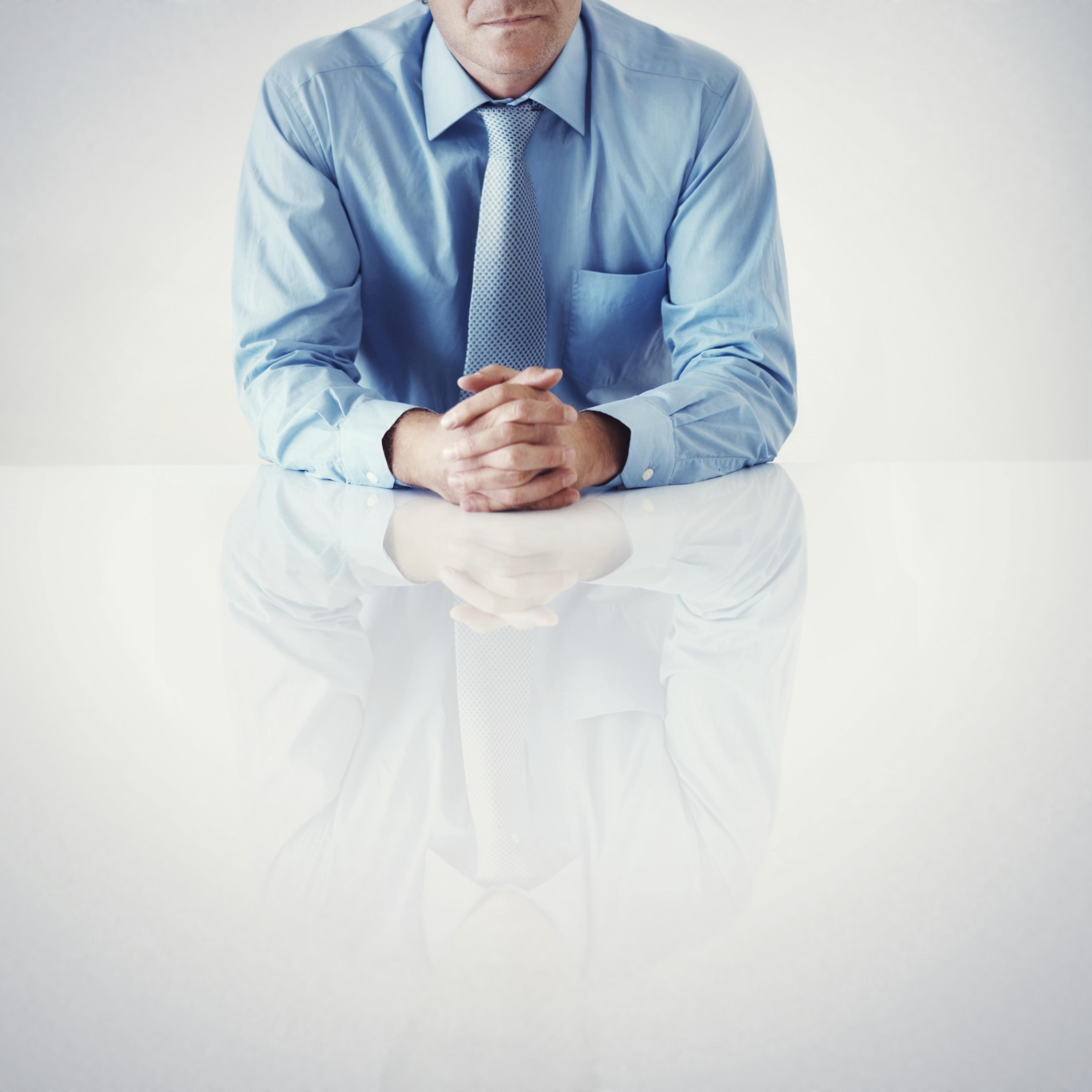 businessman-sitting-desk