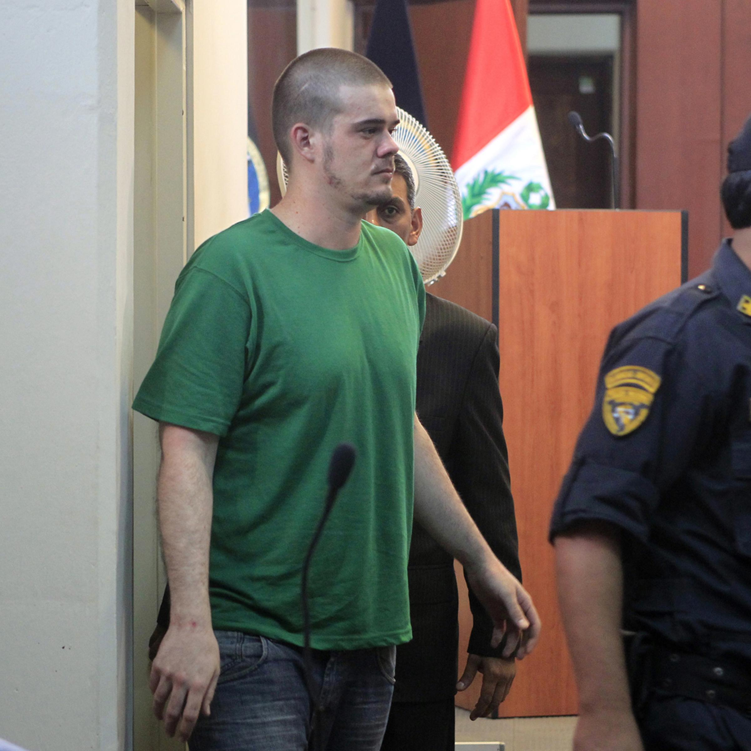 Dutch citizen Joran Van der Sloot walks into the courtroom before the reading of his verdict in Lima