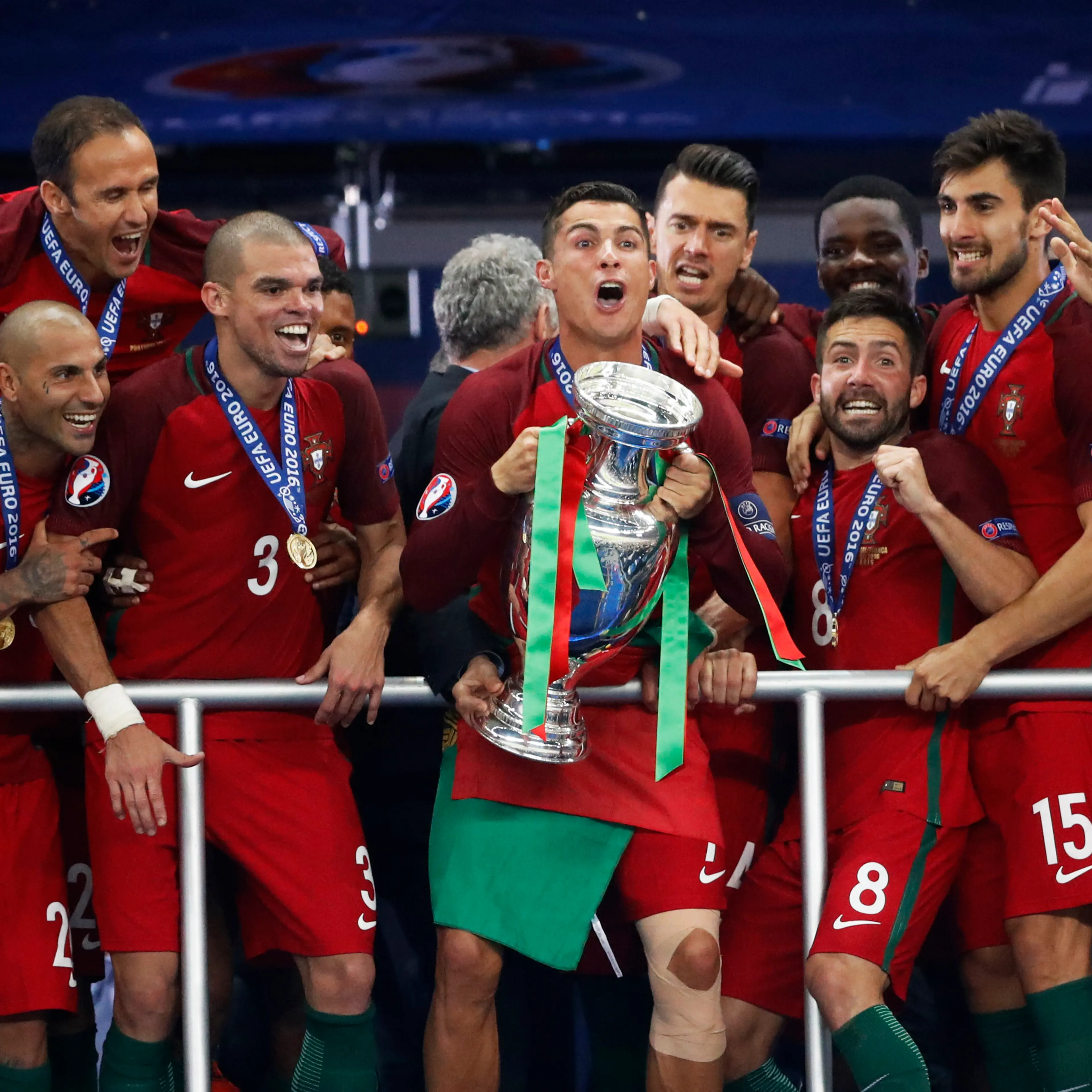 Portugal's Cristiano Ronaldo celebrates with team mates and the trophy after Portugal beat hosts France to win Euro 2016 at the Stade de France, Saint-Denis, near Paris on July 10, 2016.